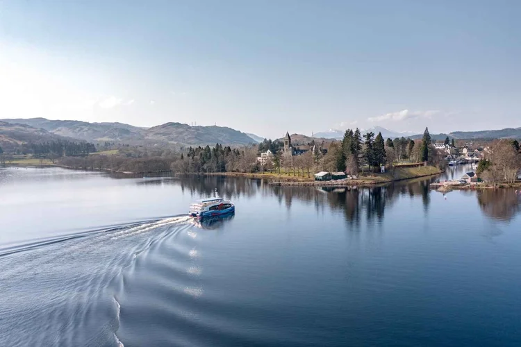 A cruise boat coming into Fort Augustus at the southern end of Loch Ness