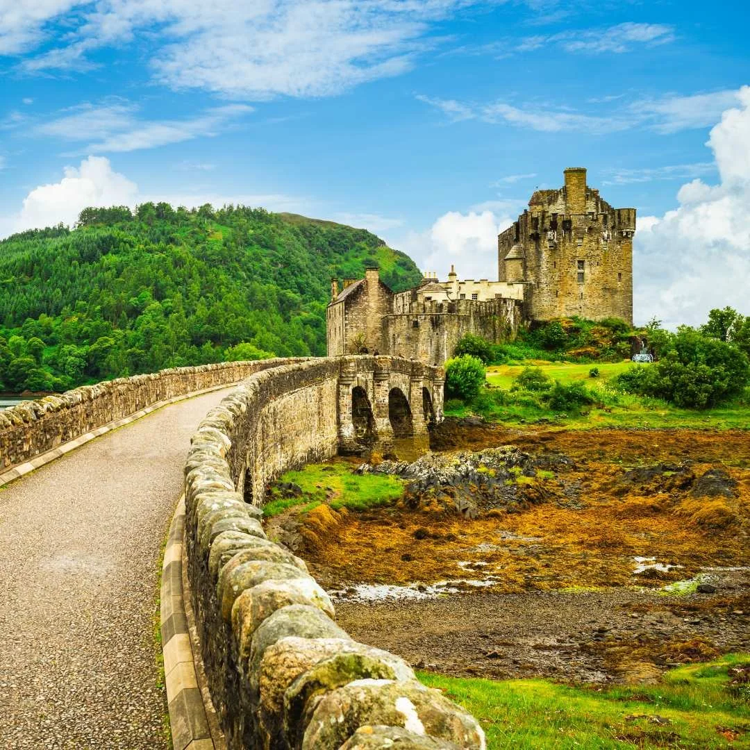 Eilean Donan Castle beneath bright blue sky