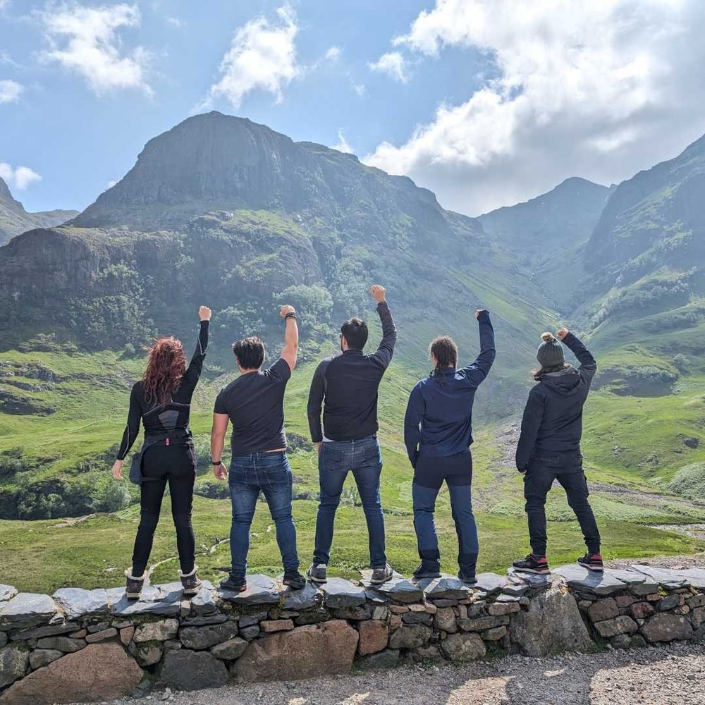 Travellers exploring Glencoe in the Scottish Highlands