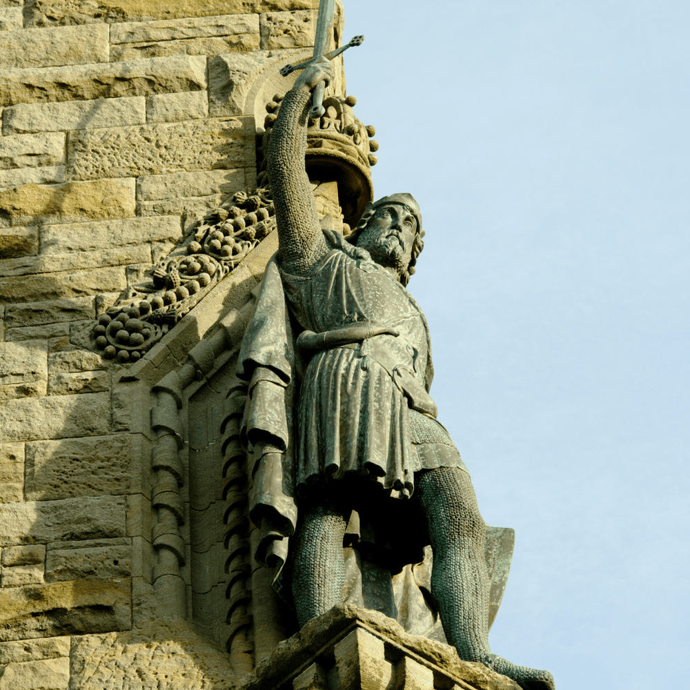 The bronze statue of William Wallace on the side of the National Wallace Monument