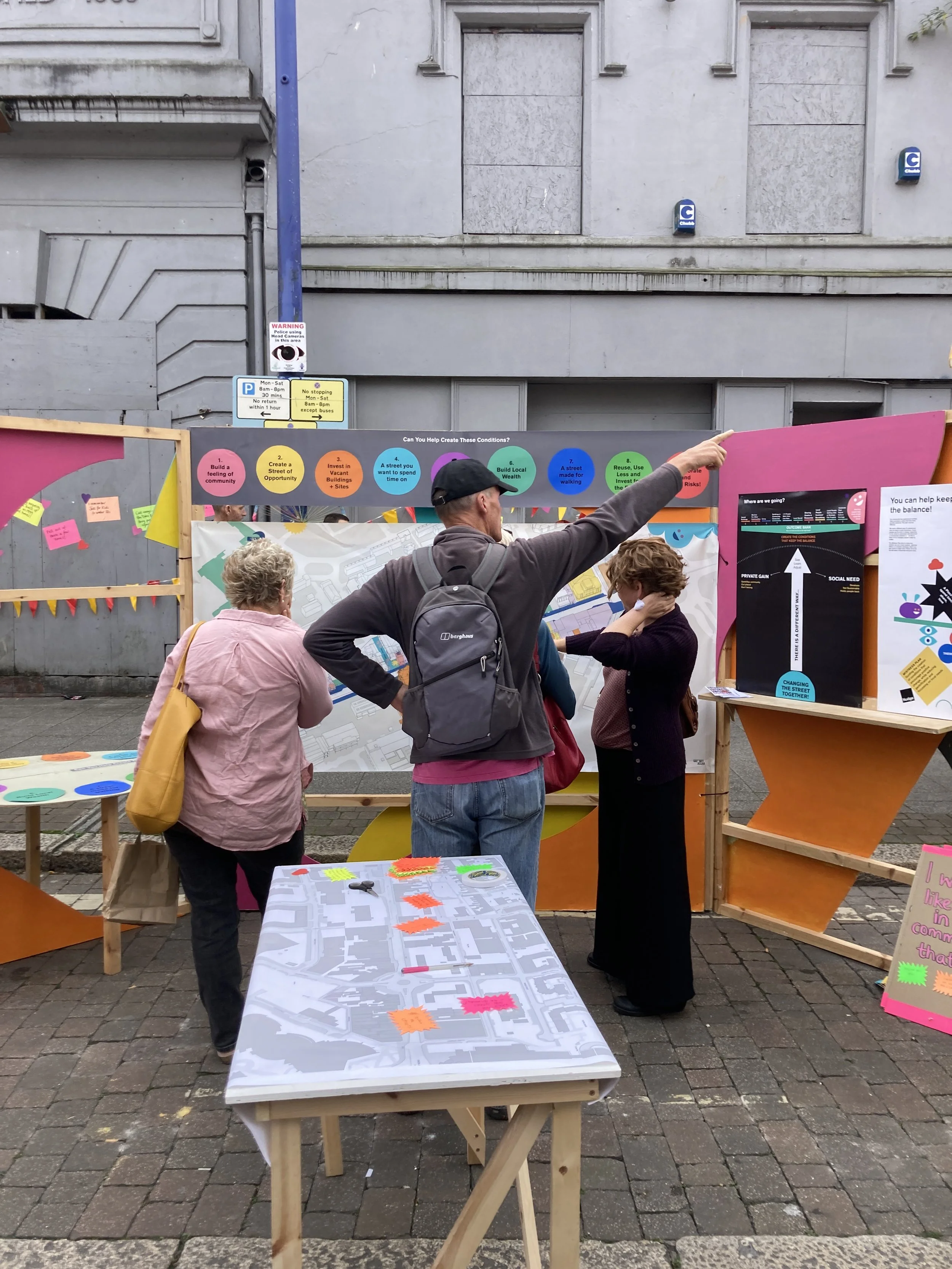 The public engaging in a community street party with Nudge Community Builders