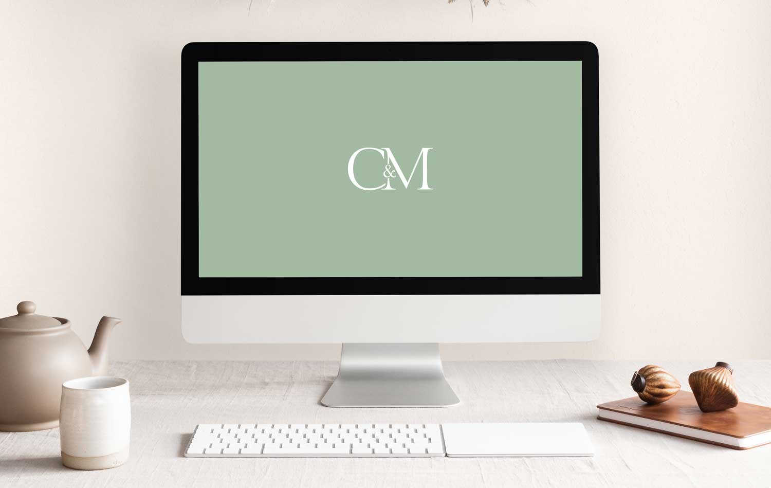 Clementine and Mint's sub logo displayed on a iMac screen