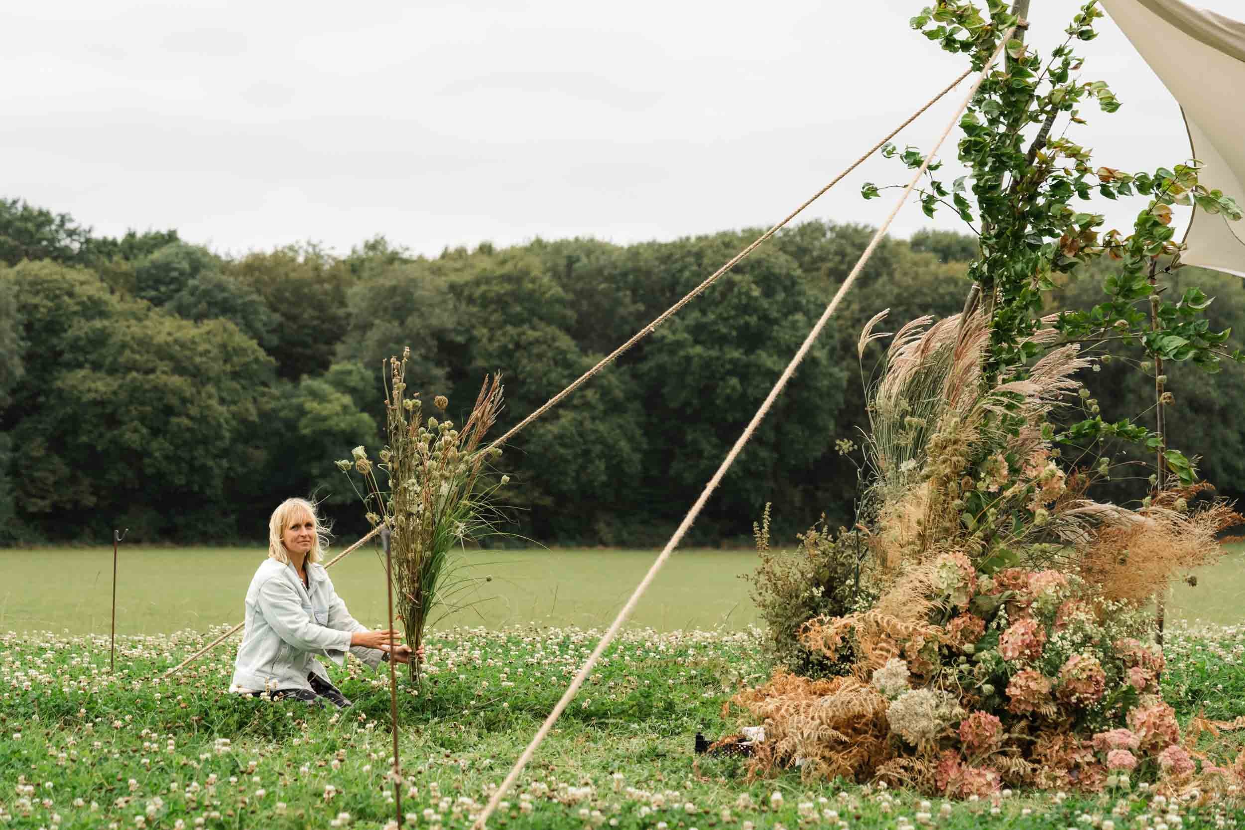 floral artist in meadow