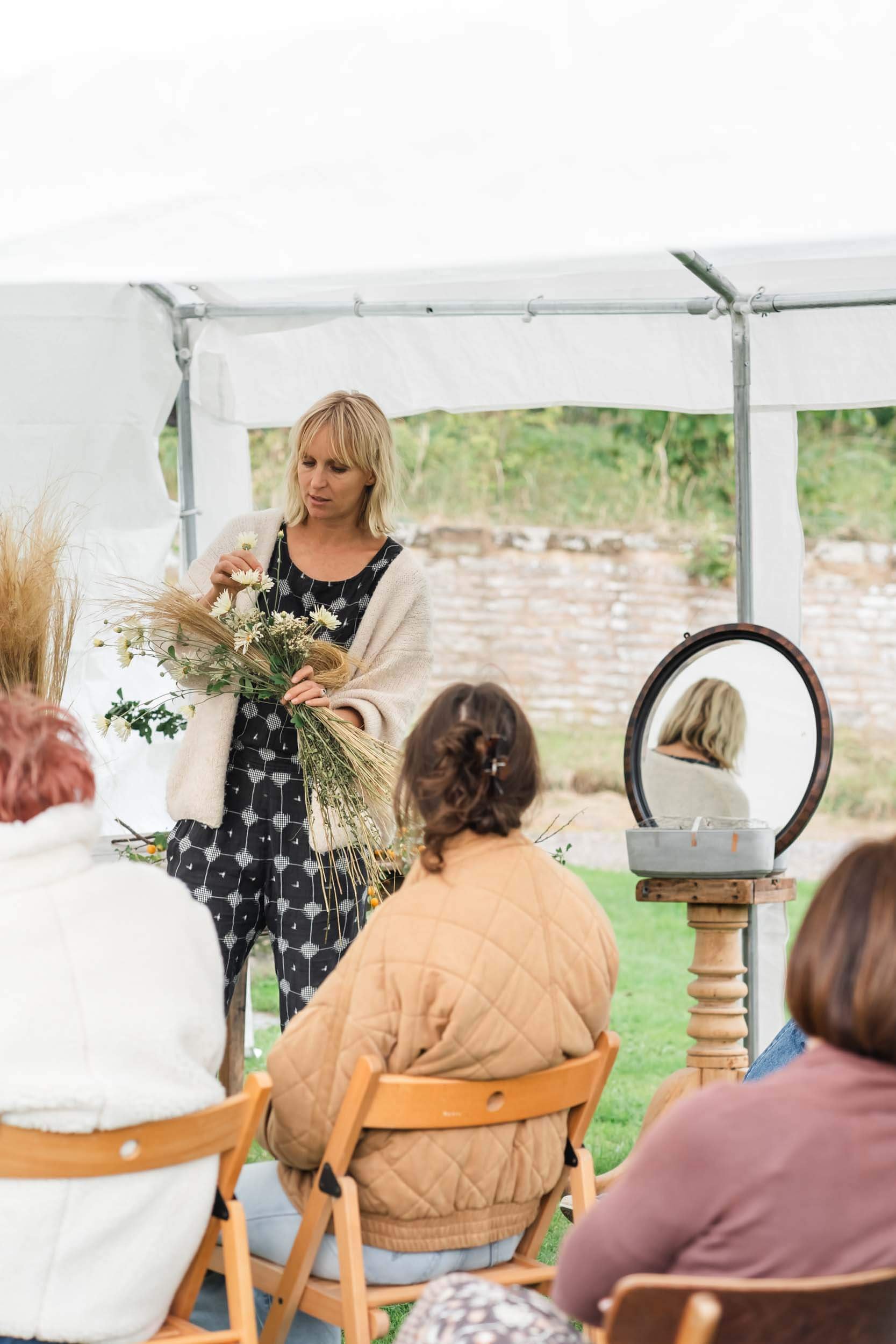 floral artist giving lesson