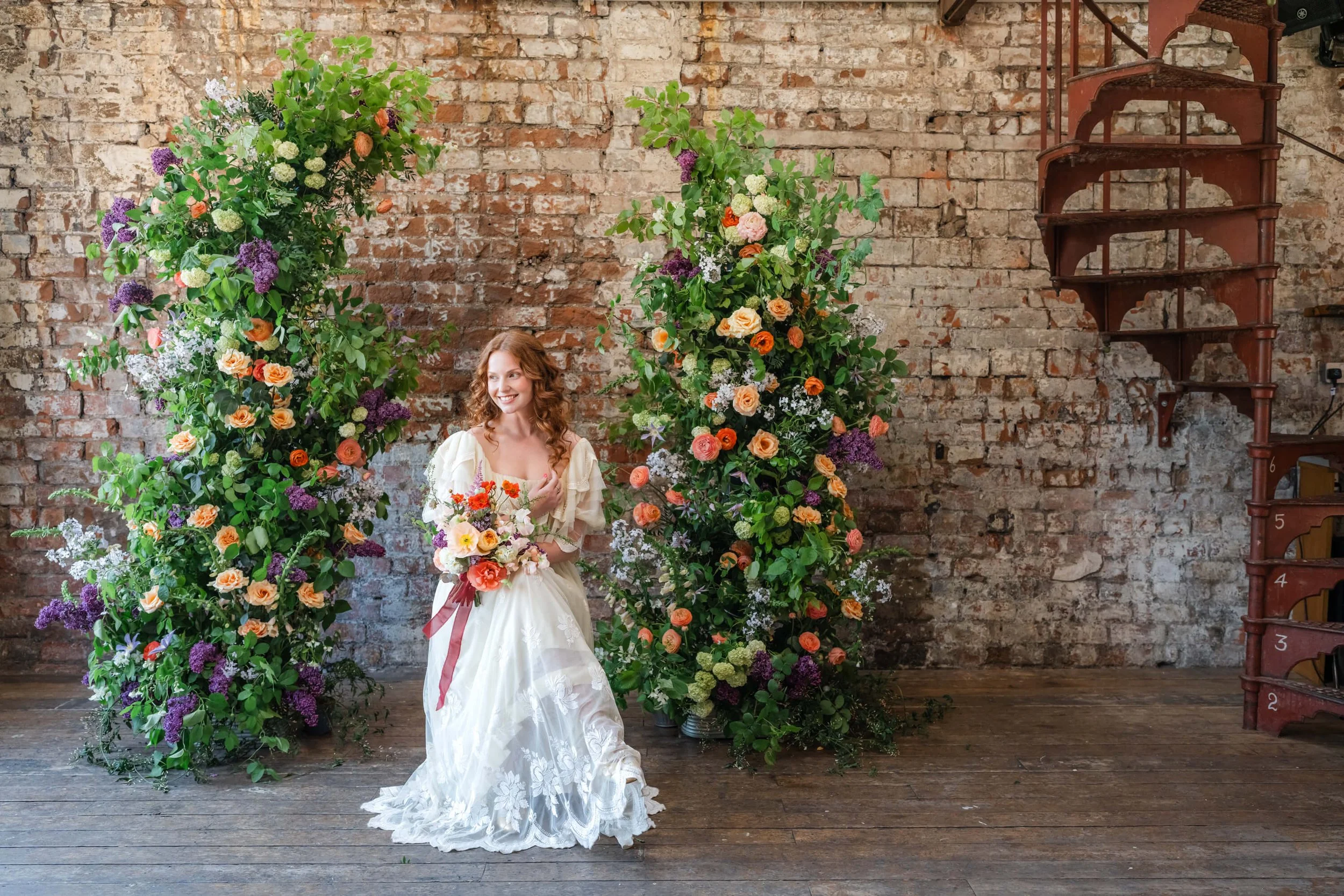 bride-in-flower-arch.jpg