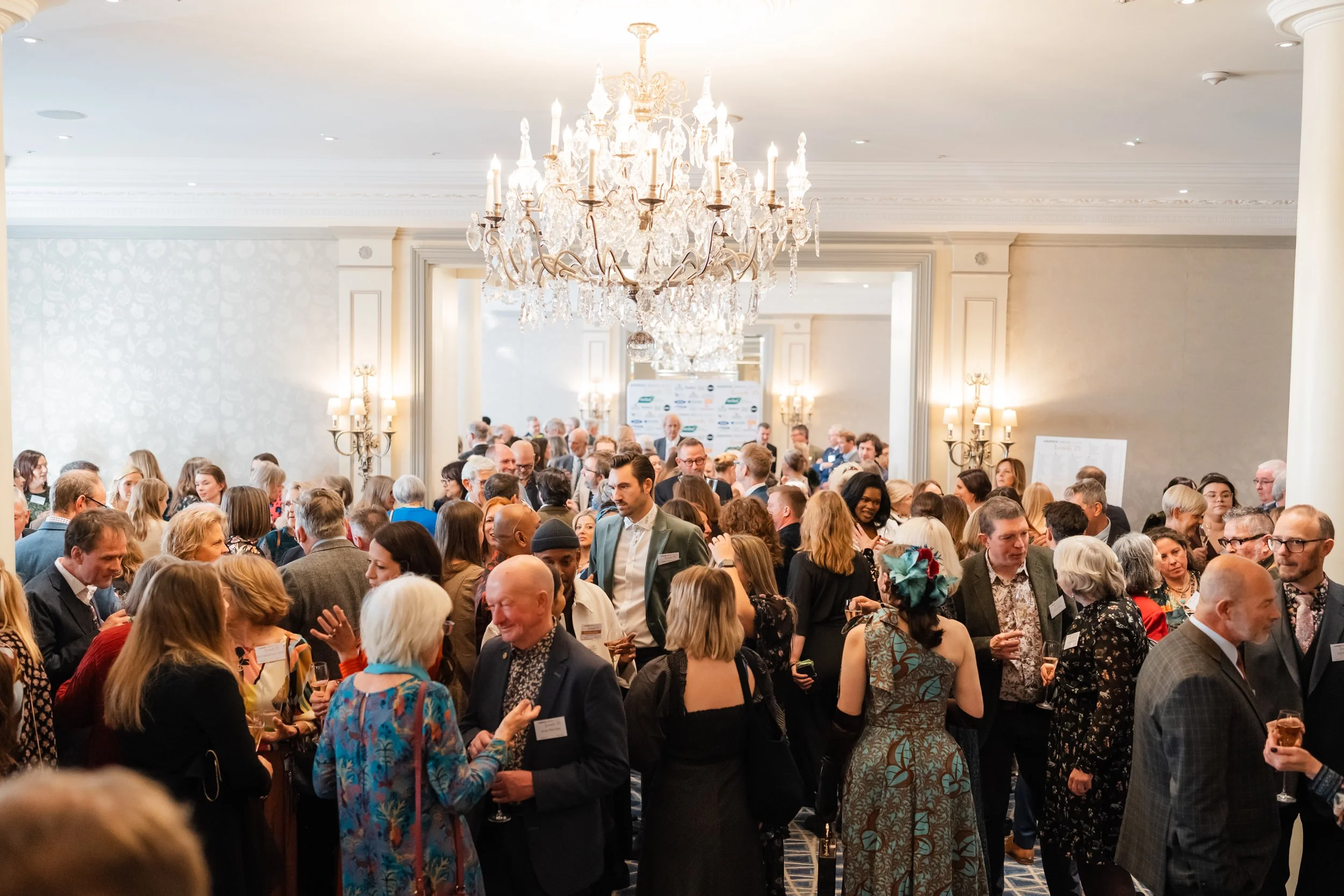 people in a room at an award event