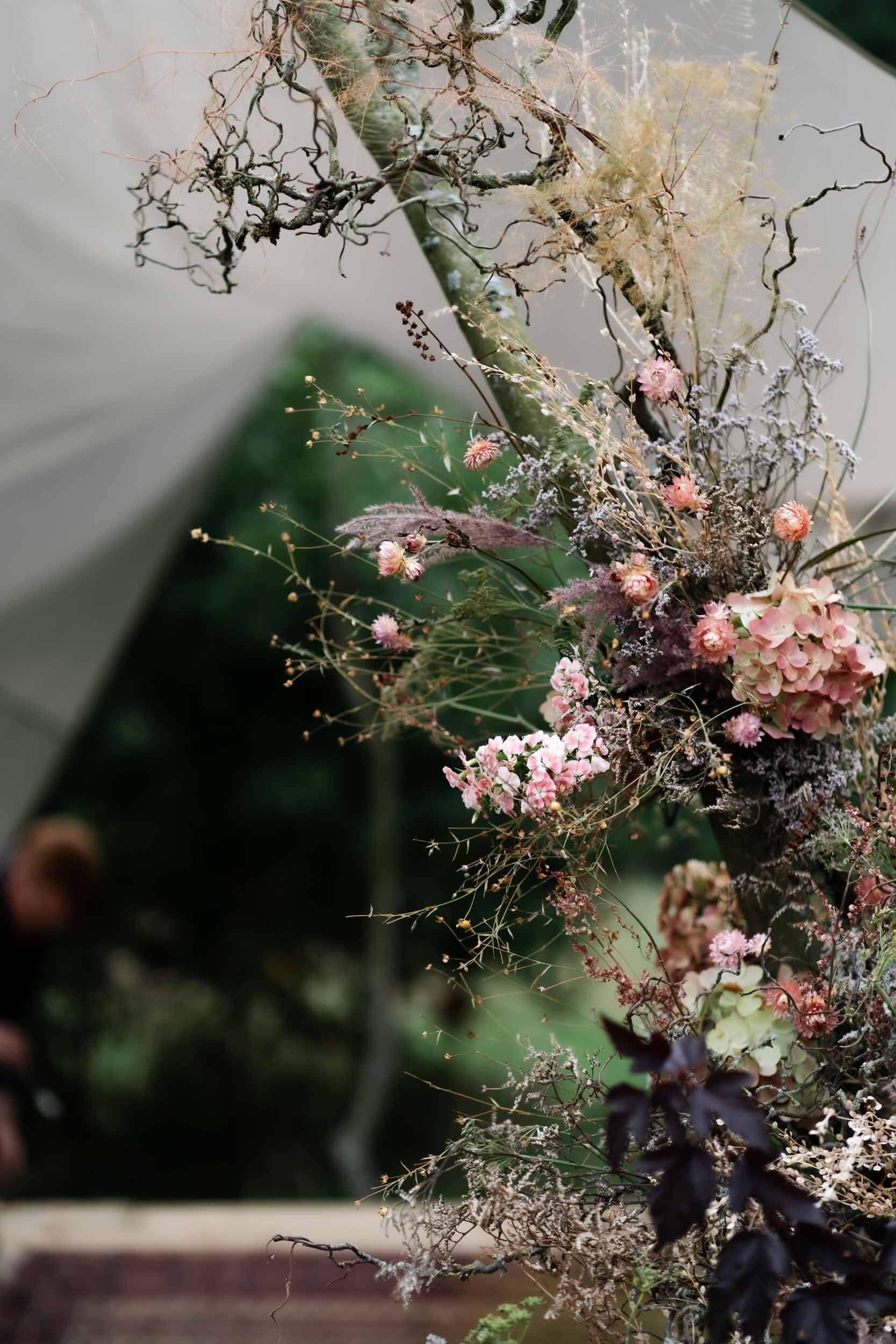 florist working on installation