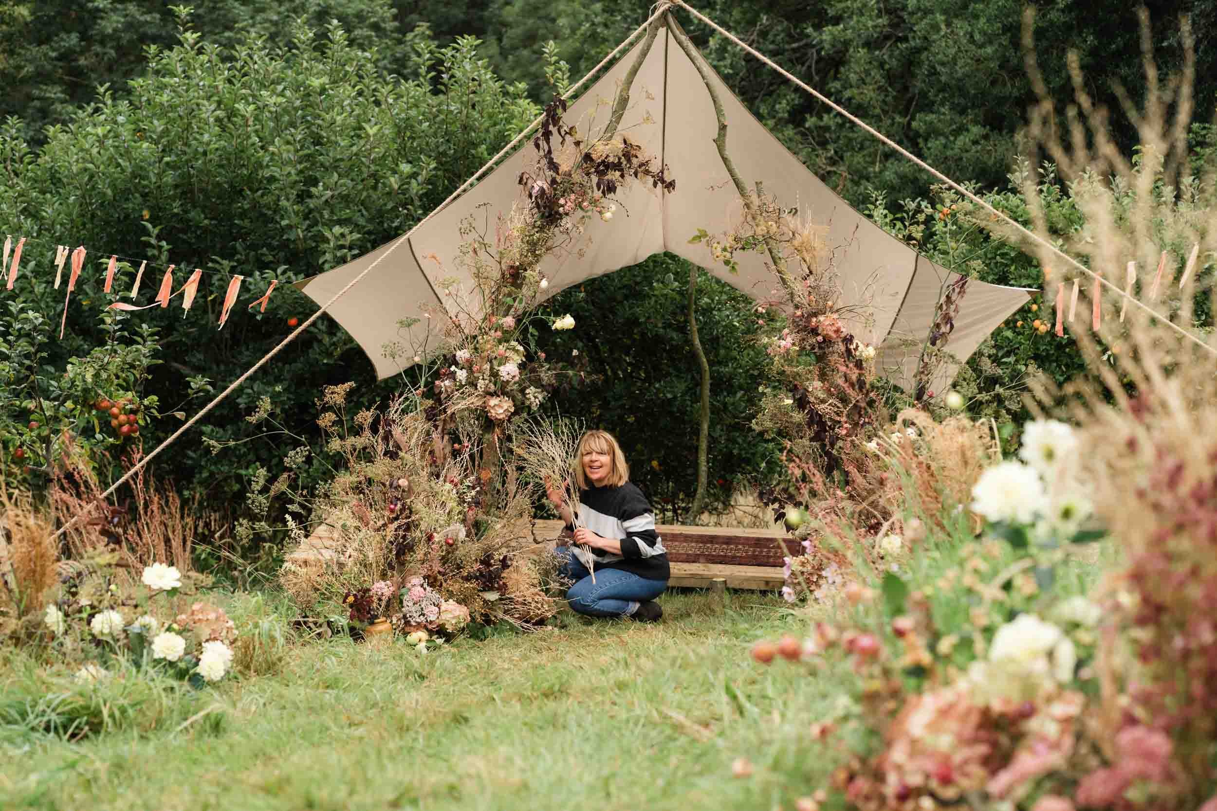florist working on installation