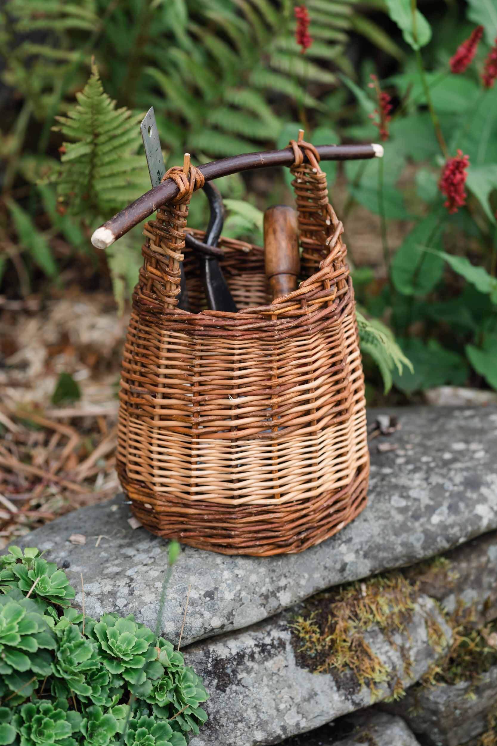 willow basket with tools in it