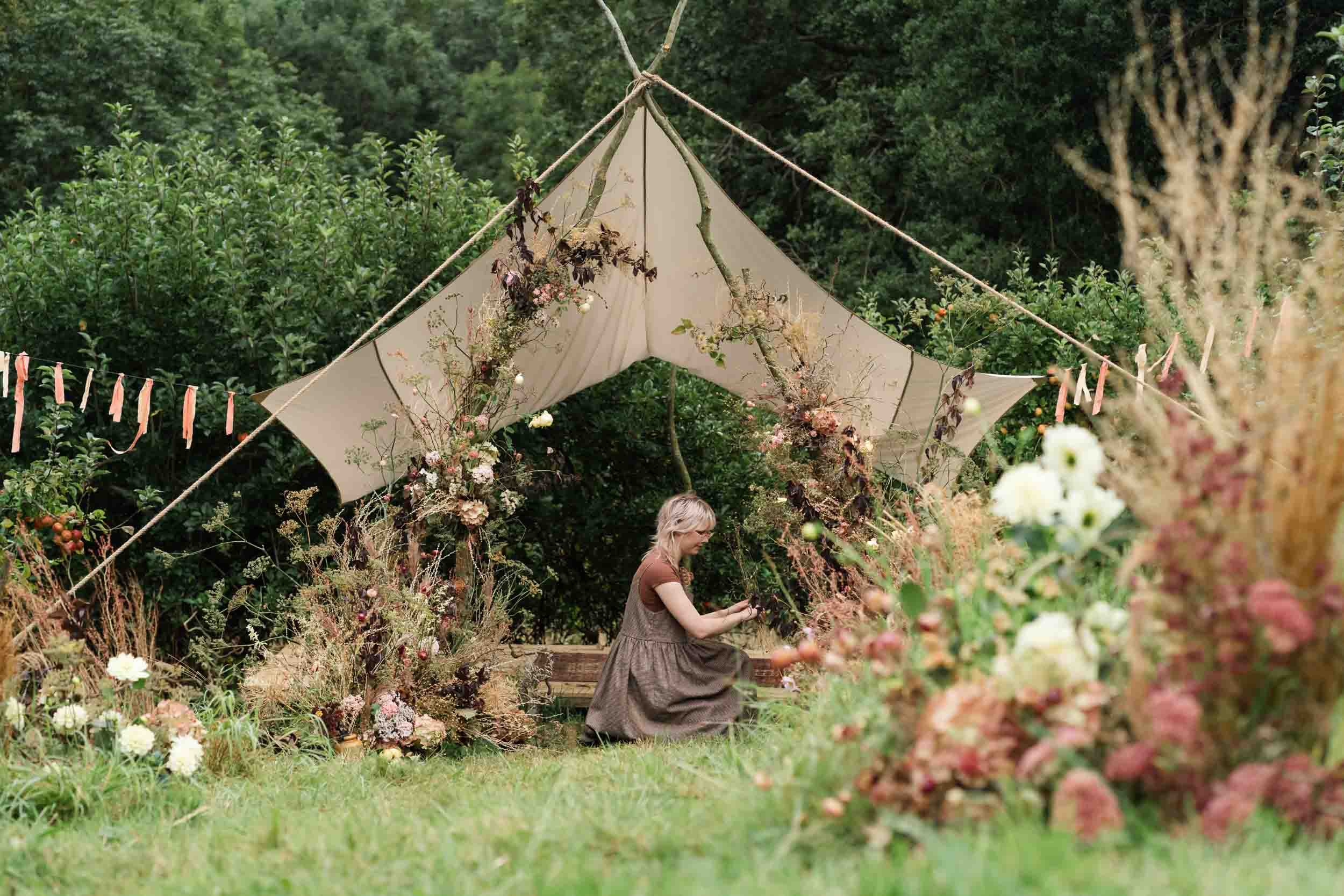 florist working on installation