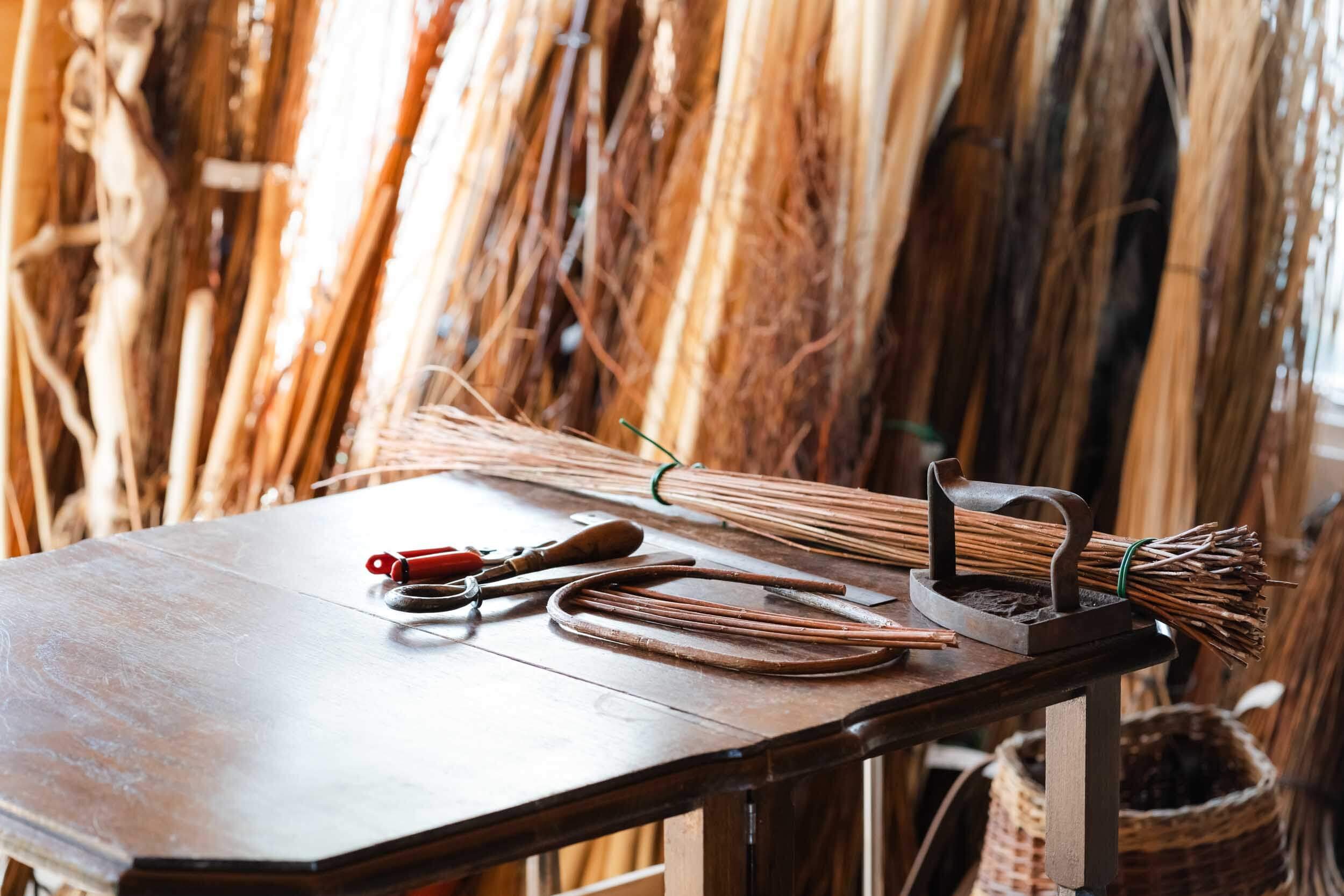 willow weaving tools on table