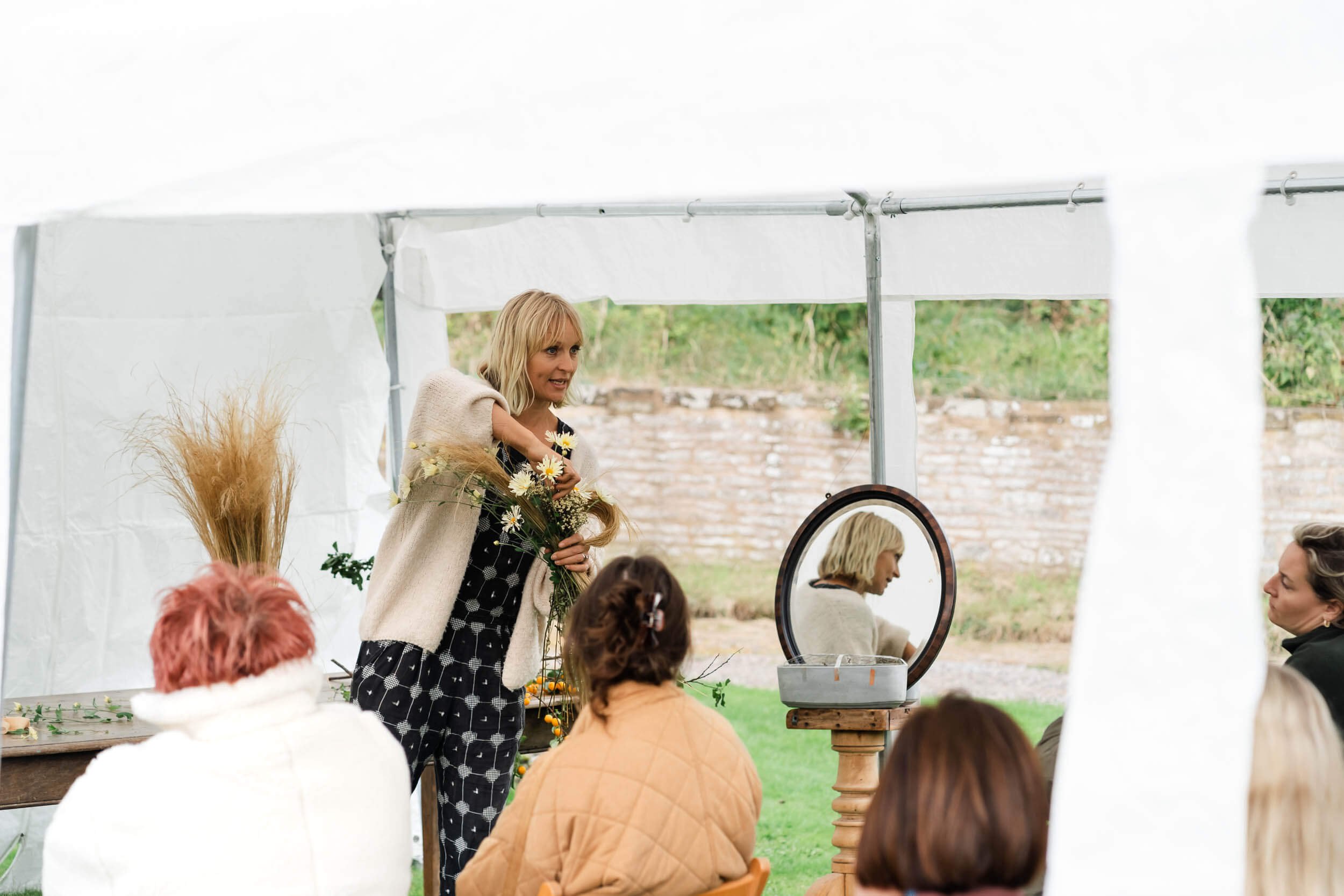 floral artist giving lesson