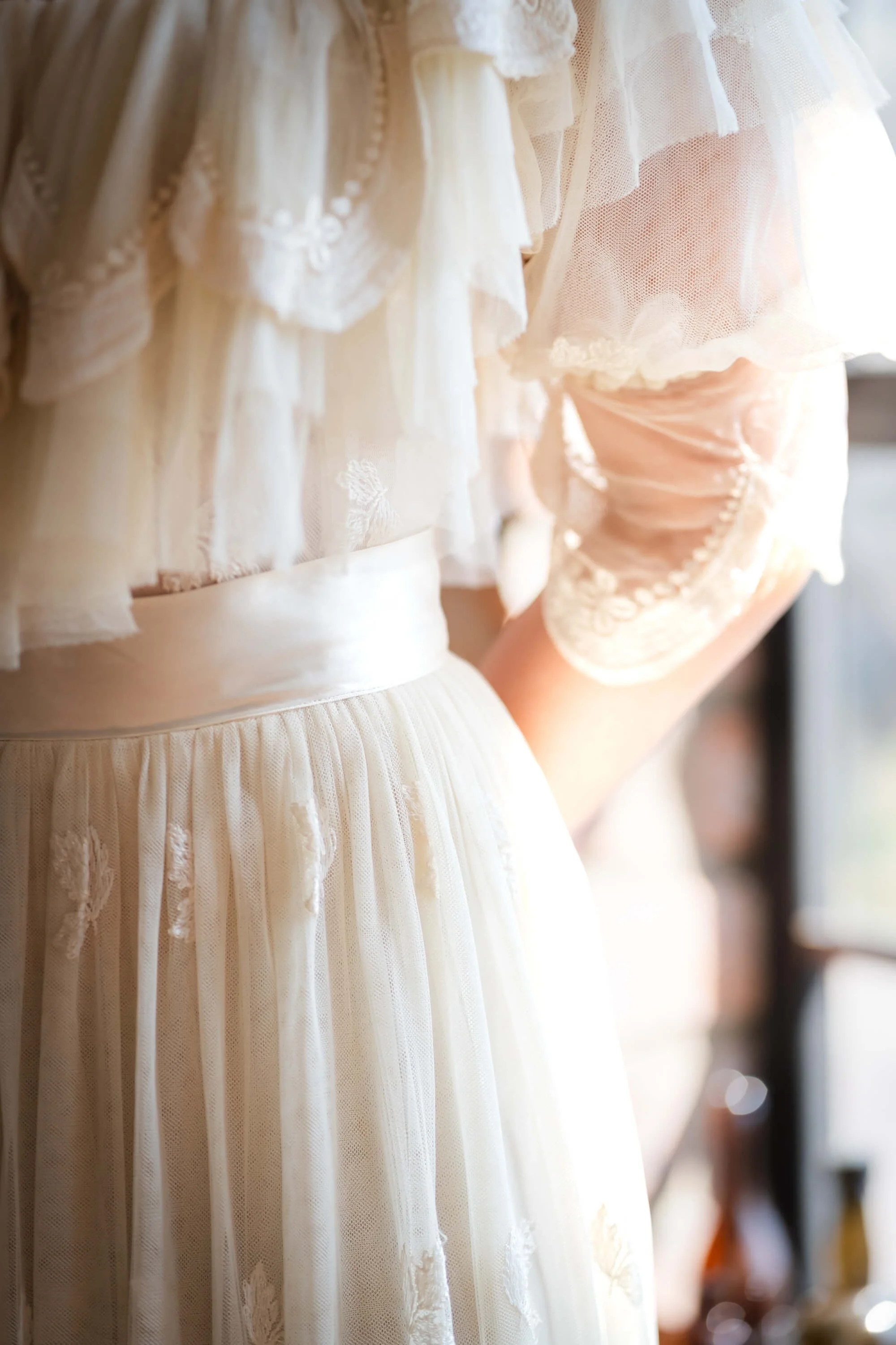 vintage-wedding-dress-by-window.jpg