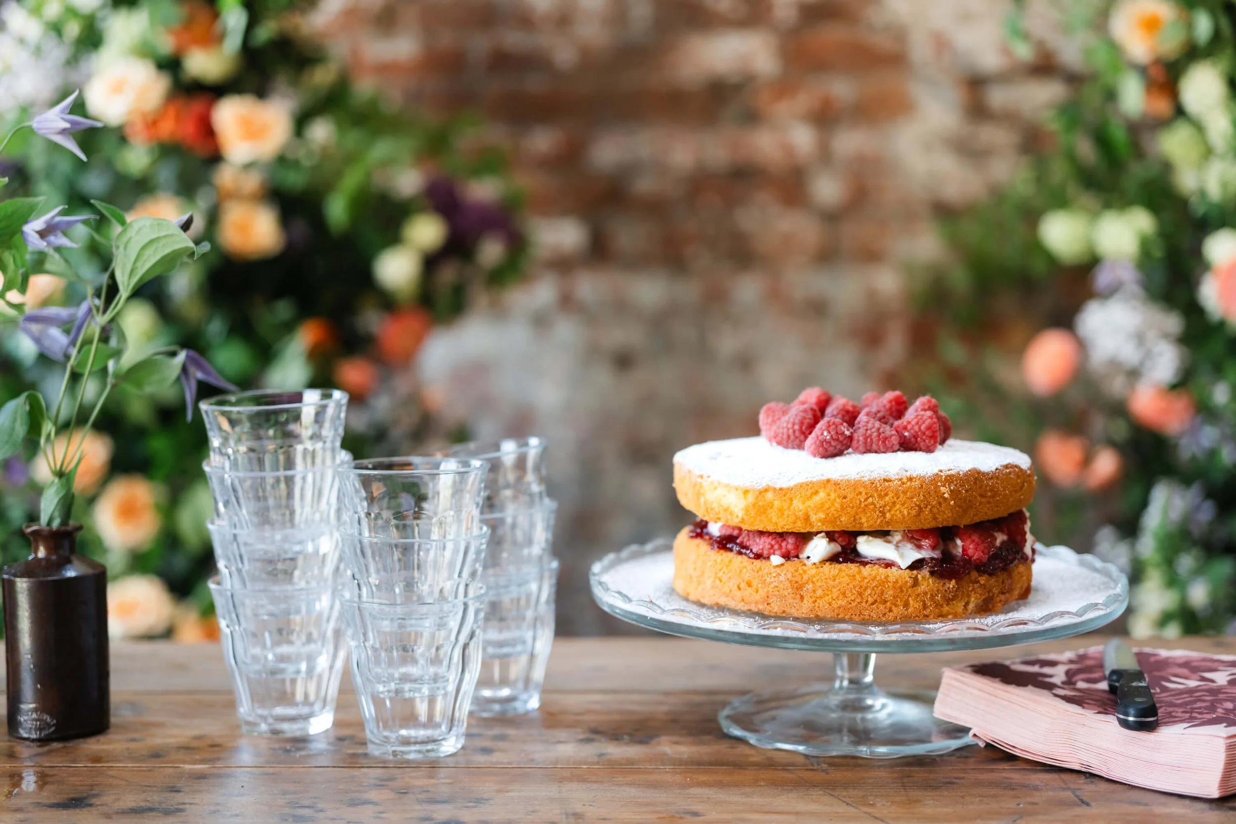 cake-on-table-in-front-of-arch.jpg