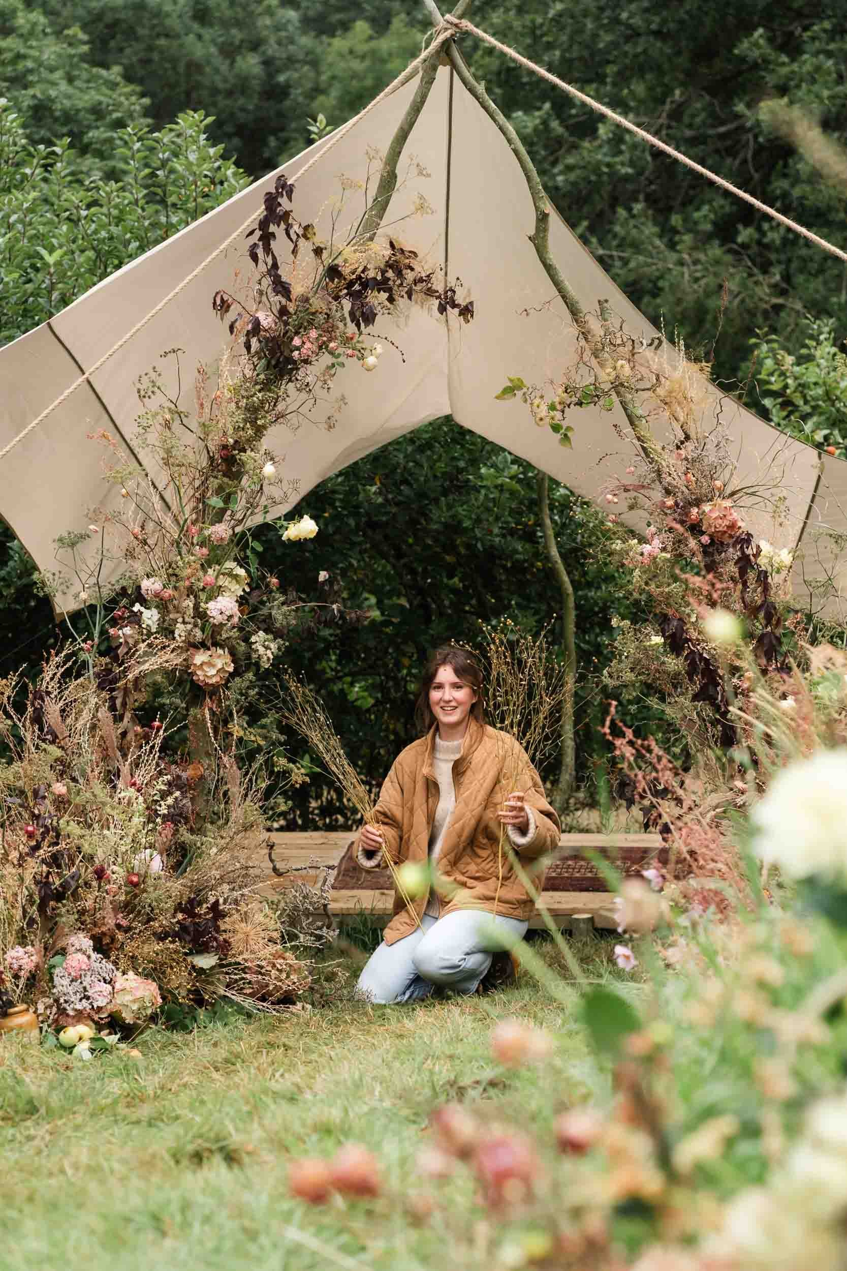 florist working on installation