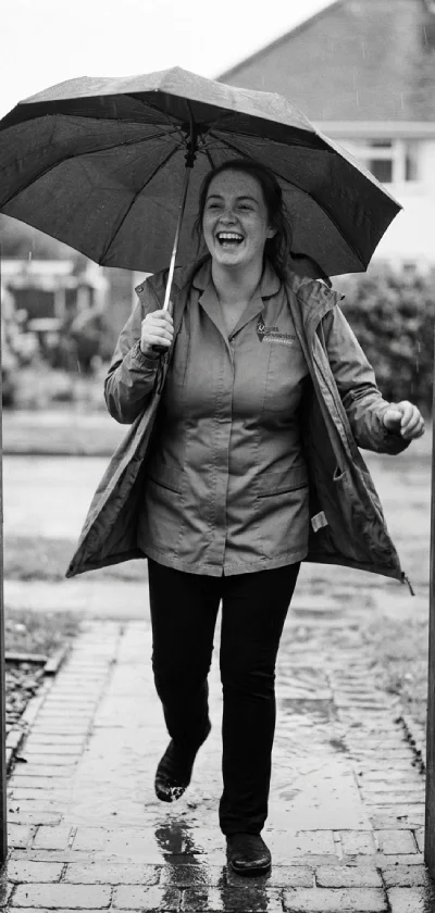 Woman smiling and walking with an umbrella on a rainy day in an outdoor setting.
