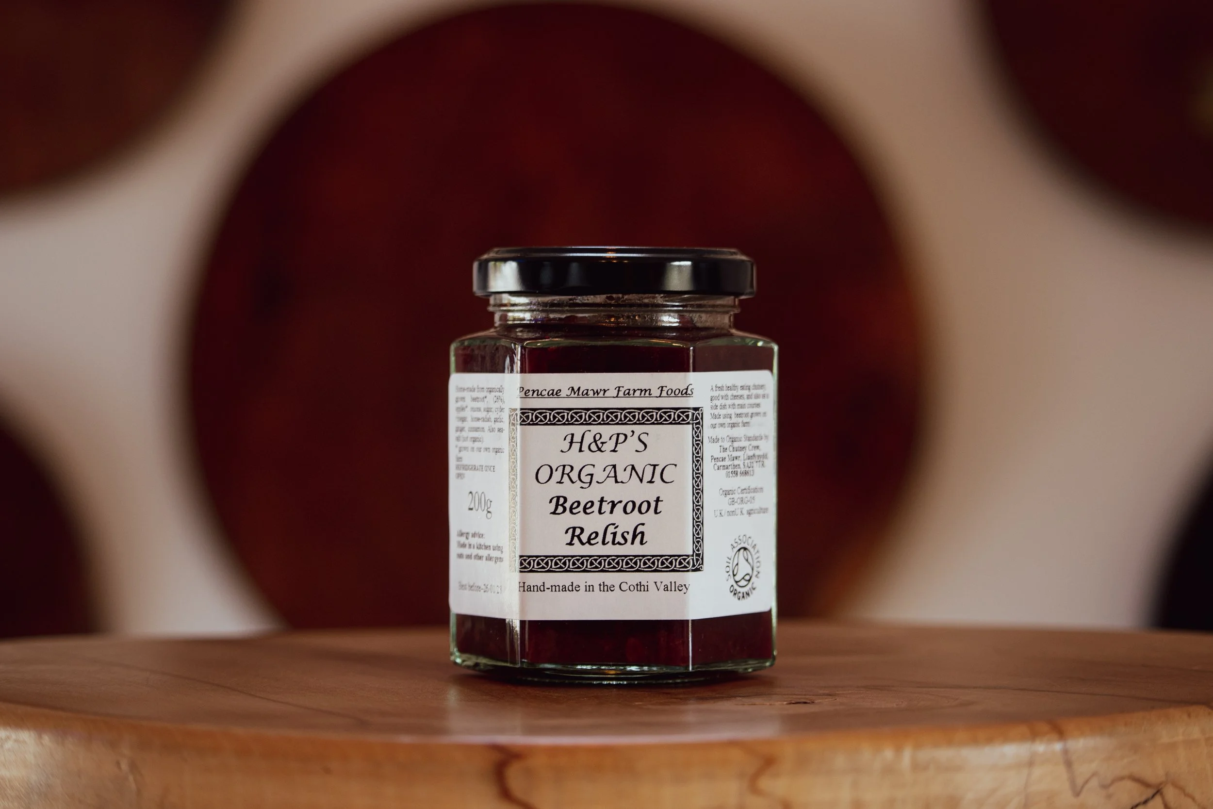 Beetroot Chutney Relish on wooden table in farm shop