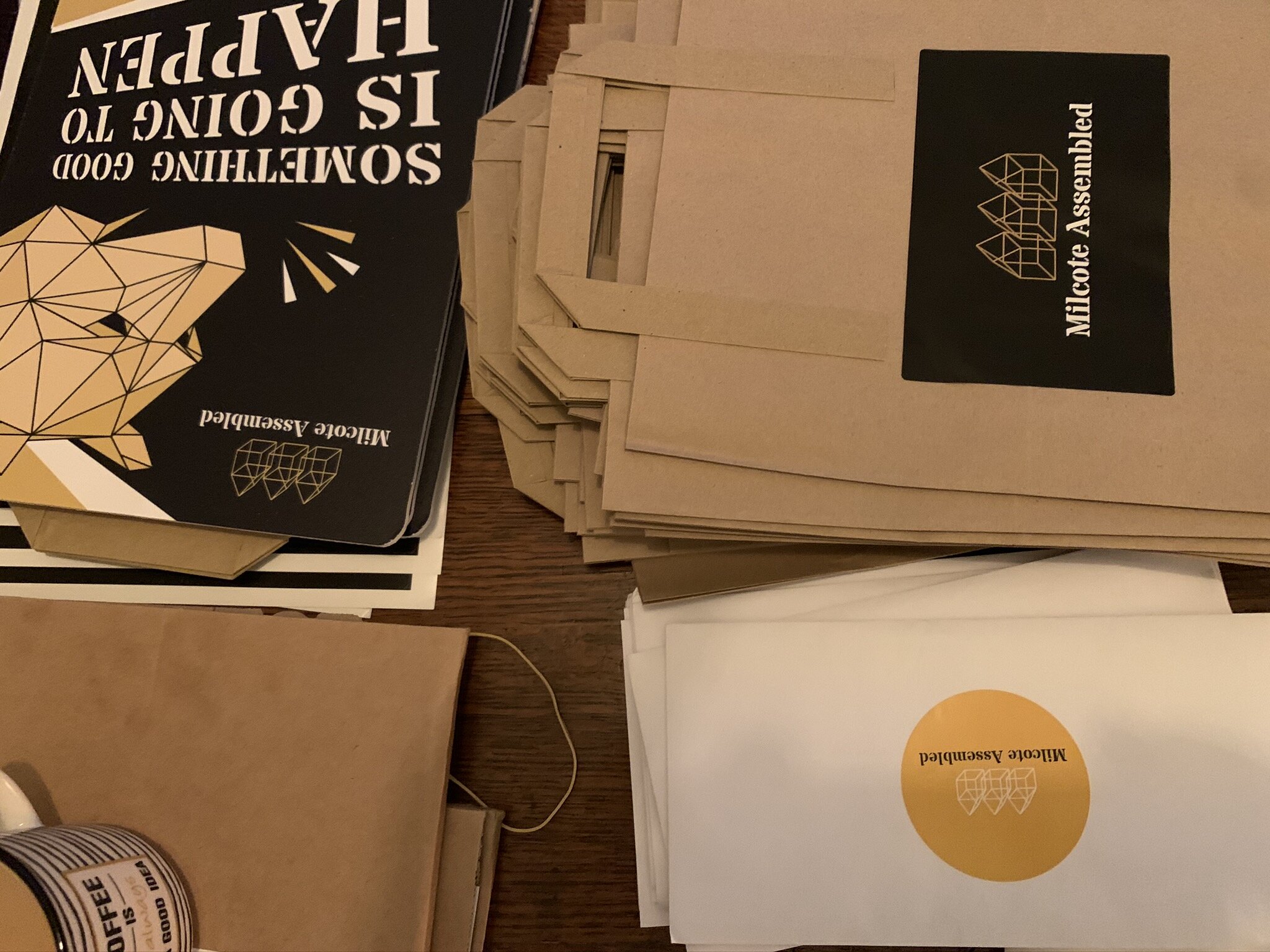 Collection of printed materials and informational sheets about metalcore assembly, including signage and booklets for a conference or event.