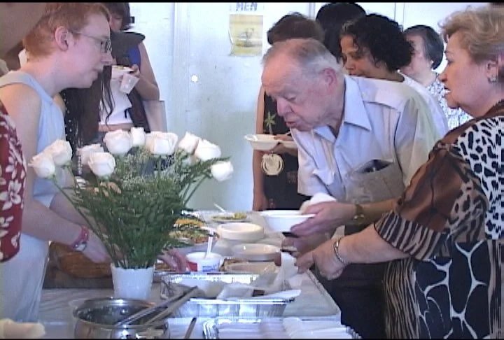  Lower East Side Neighbors and Nicolás Dumit Estévez,  Takeout/An Edible Portrait of Home , 2004 / Still from video by Geoffrey Jones 