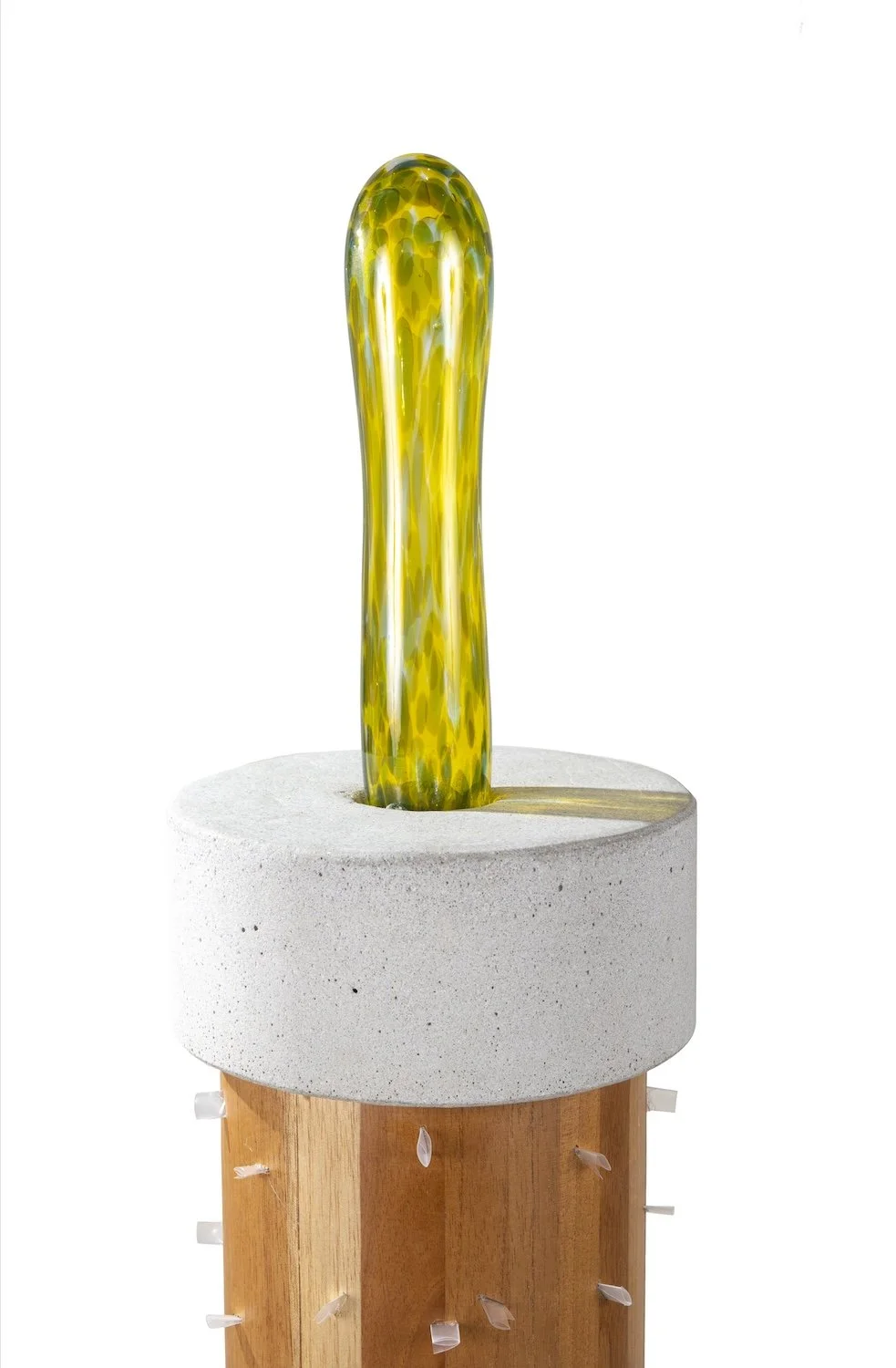   Paved Paradise II  (detail) /  Serie: Tropicaribastral , 2025 / Cedar Wood, cast cement, blown glass, 22 cm diameter x 115 cm / Photo: Mariano Hernández 