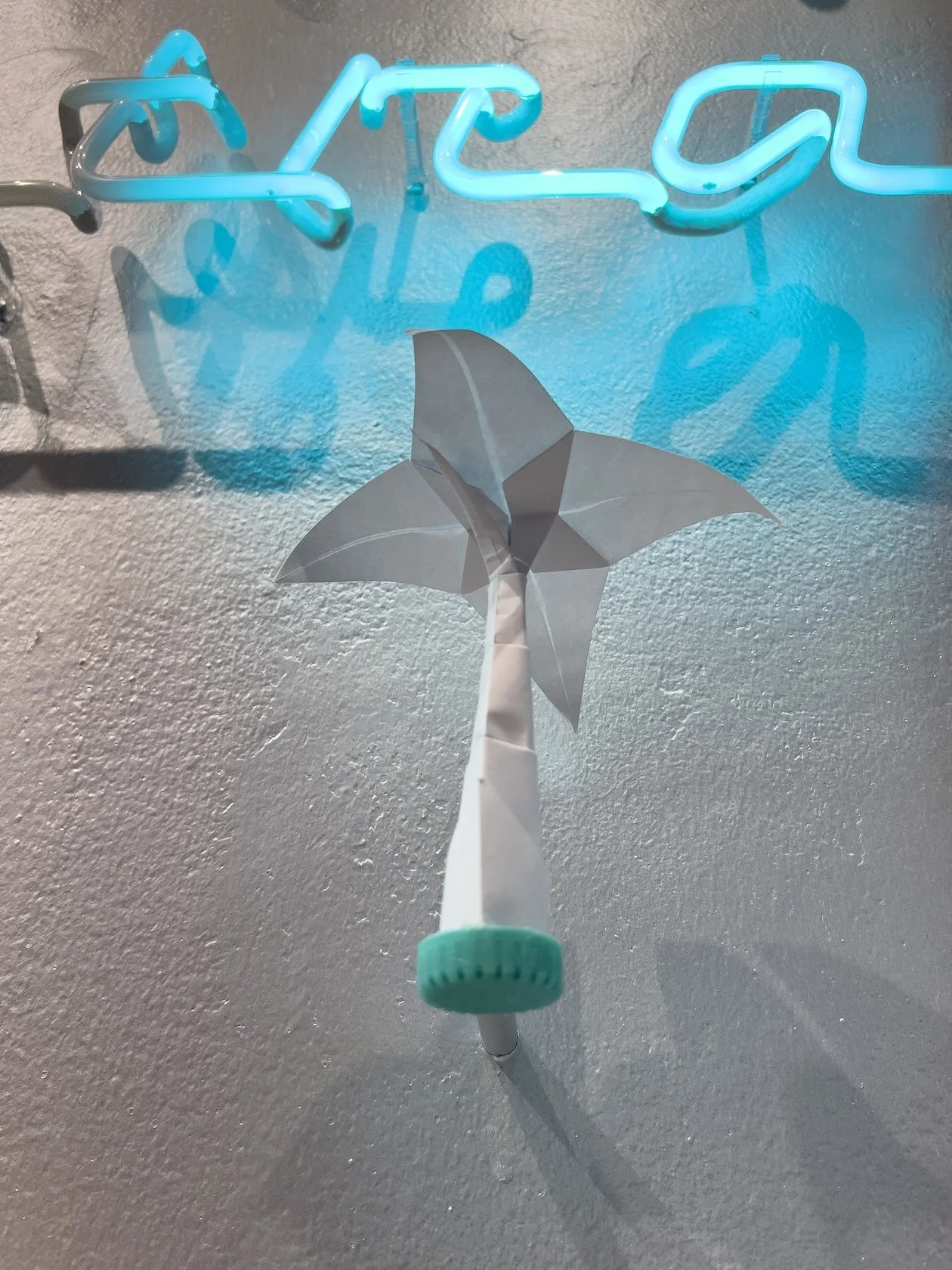   Tropicaribastral  (detail), 2025 / Neon, paper, plastic caps, wood, and pearl paint, 450 cm x 500 cm / Photo: Mariano Hernández 