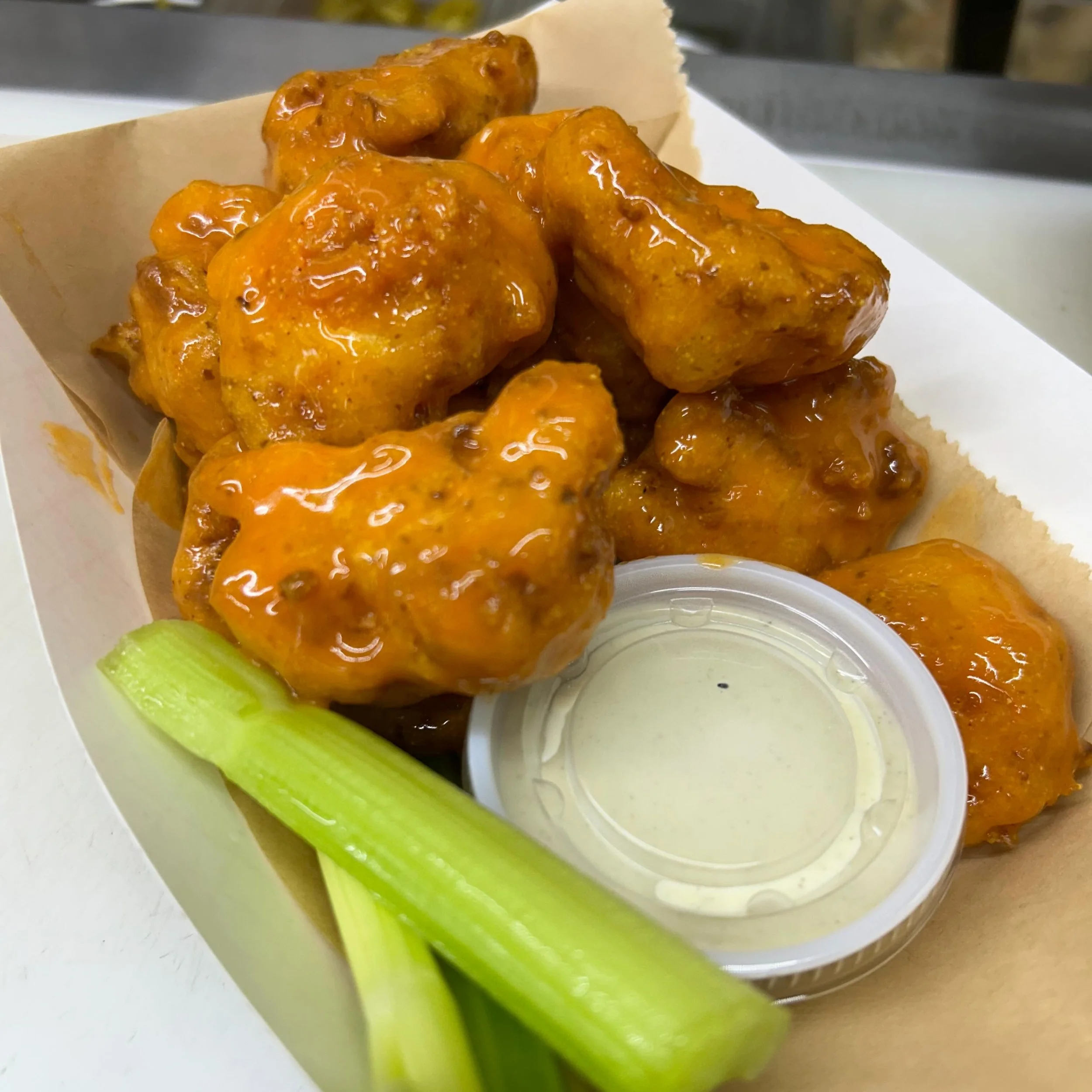 When life gets you down, eat more Buffalo Cauli Wings! Or hotdogs, or chz fries, or chocolate chip cookies. Which one is your comfort food? Find us @patronsaintsbrewery from 12-8pm. #vegan #plantbased #vegantoledo #foodtruck #cauliflowerwings