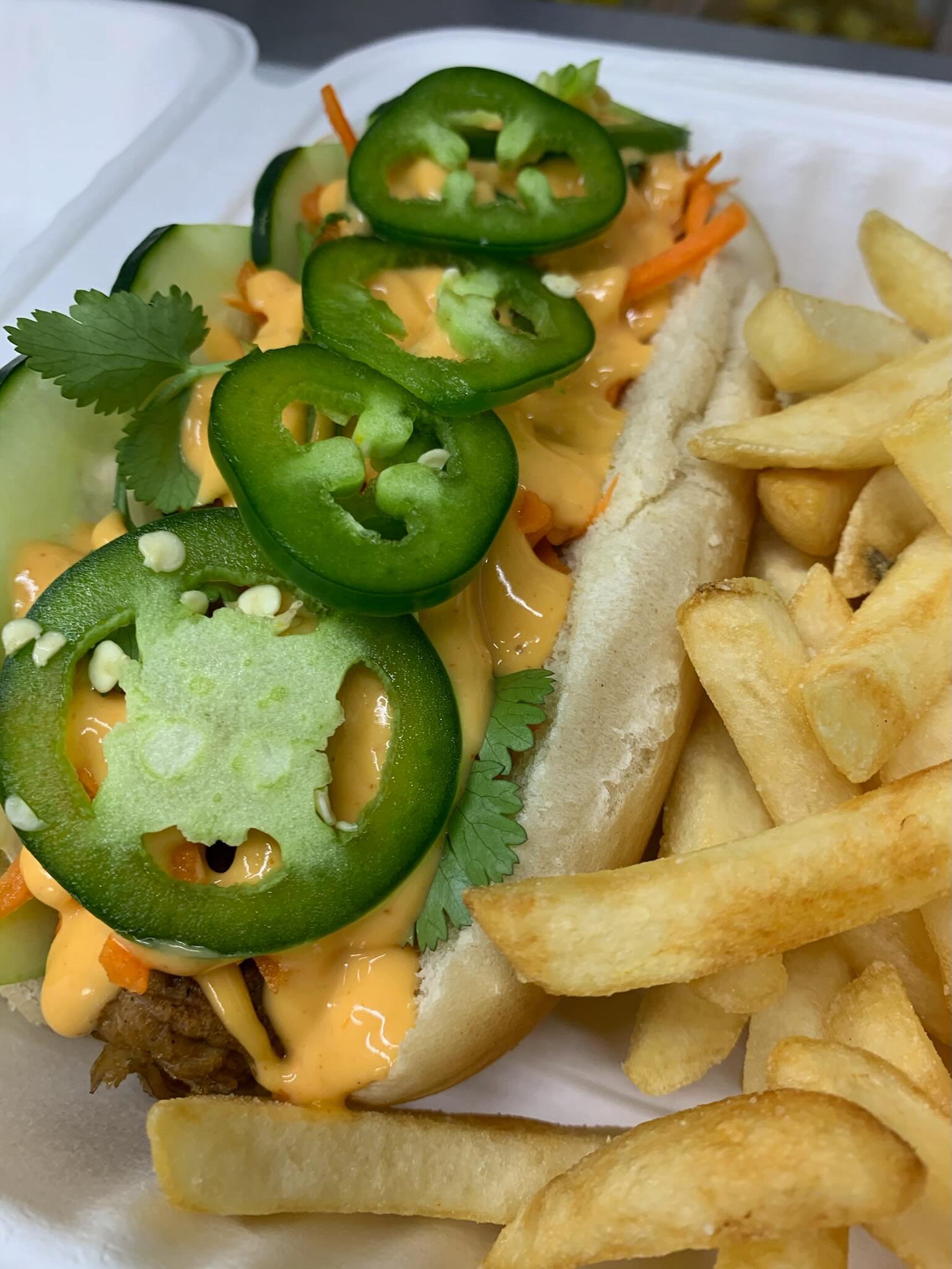 Balmy weather calls for the fresh and spicy Banh Mi Dog! Topped with fresh carrot, cucumber, cilantro, jalape&ntilde;o &amp; sriracha mayo. Find us today @humaneohio from 11:30-2pm for a delicious lunch. We also have some extra specials today only! :
