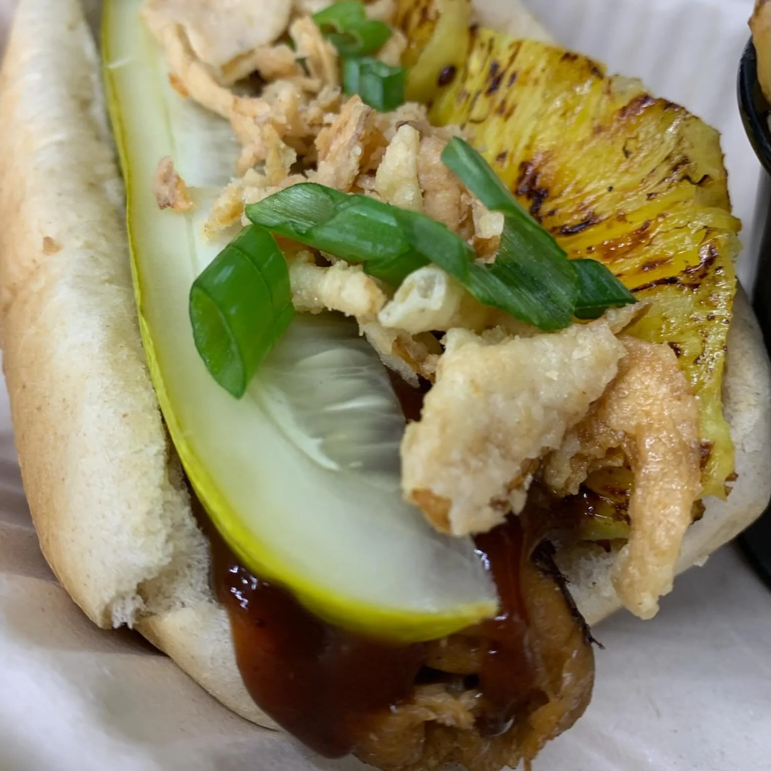 We will be closed for a summer break next week, so Come by for a Hawaiian Dog today @patronsaintsbrewery from 12-8pm. We have potato salad, all the desserts, lots of Mac n Chz and Dippers! #vegantoledo #toledoeats #plantbased #grilledpineapple #potat