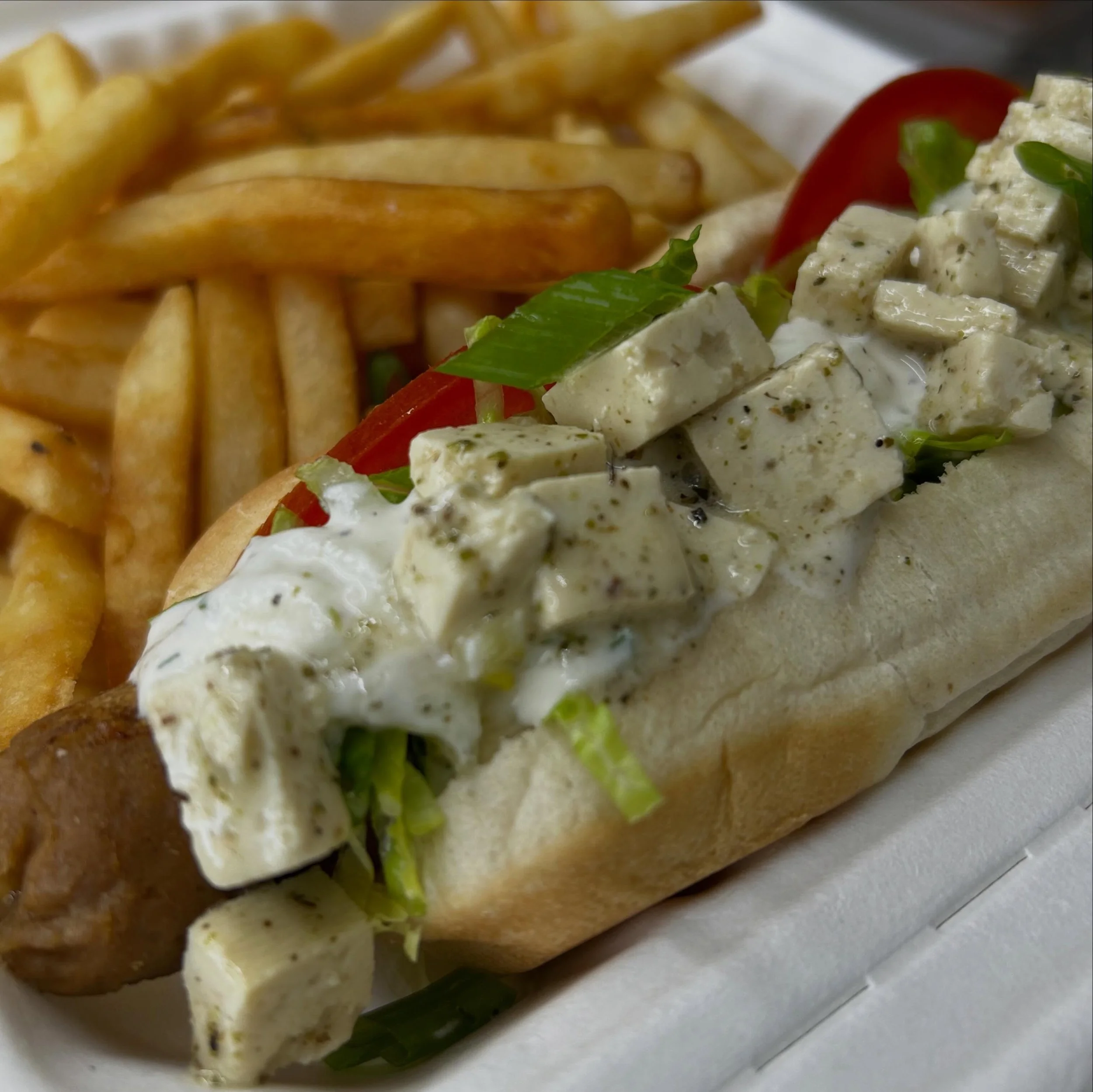 Greek Dog is back on special, topped with tomato, romaine, tzatziki sauce &amp; tofu feta! Get it today @humaneohio from 11:30-2pm. We also have a fresh batch of Fruity Marshmallow Crisps! Come and grab lunch!  #vegan #plantbased #vegantoledo #michig