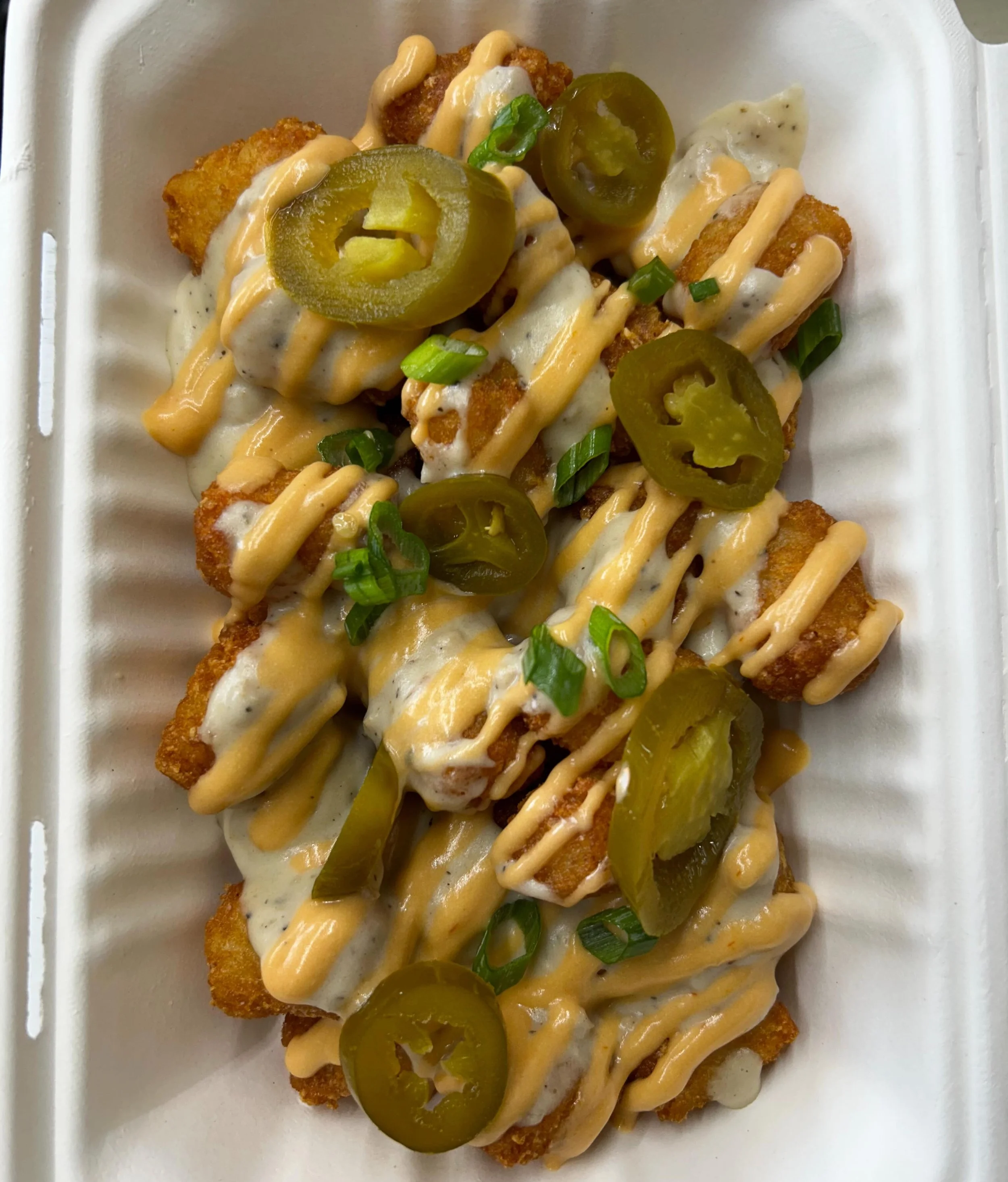 Skipped Breakfast? We got you covered. . . In vegan sausage gravy! Come grab a Breakfast dog or Totchos @patronsaintsbrewery today from 12-8pm. Fresh goodies from @sugar.rusch.bakery and a Flower Truck! @petalandfernflorals  #plantbasedfood #vegantol