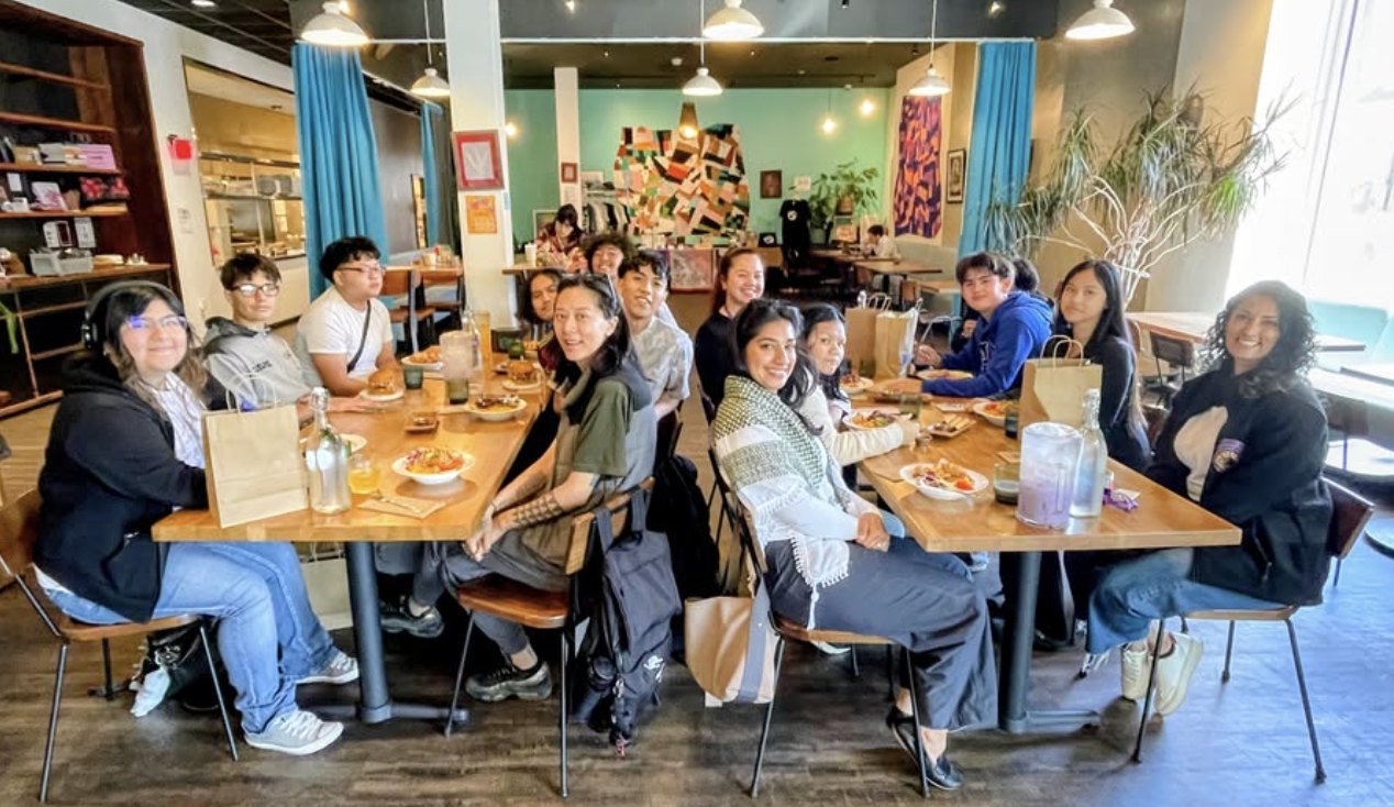 ARISE students and staff from the AAPI affinity group sharing a meal