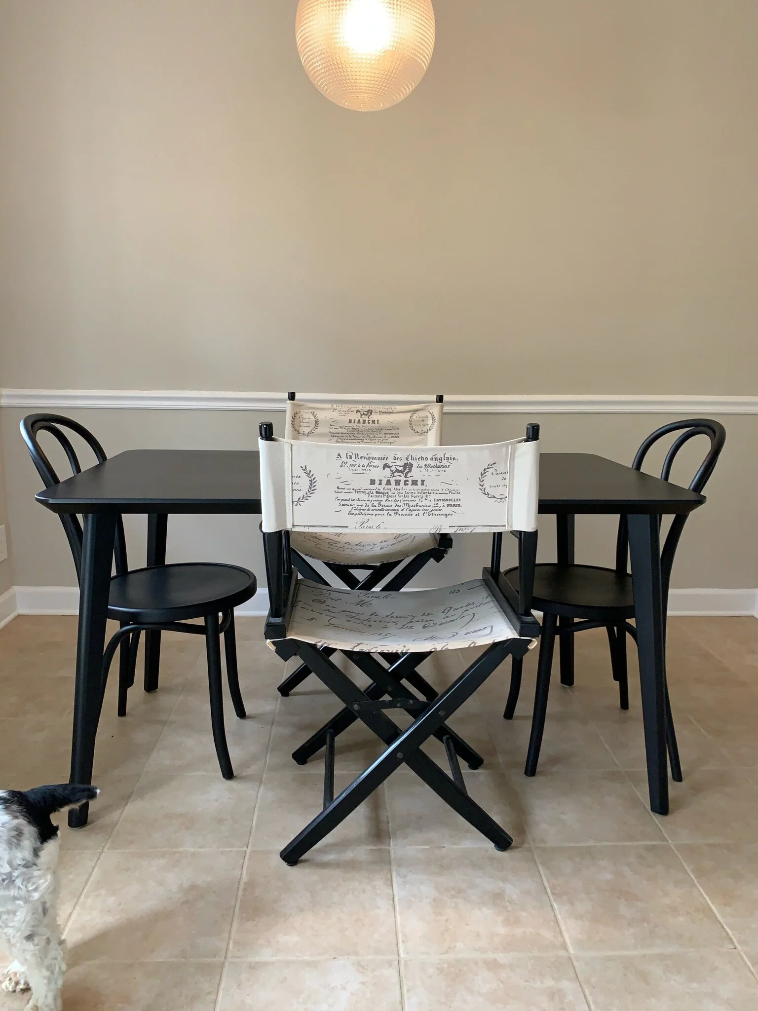 A front-on photo of the breakfast nook, standing near the oven. Do you see Birdie?