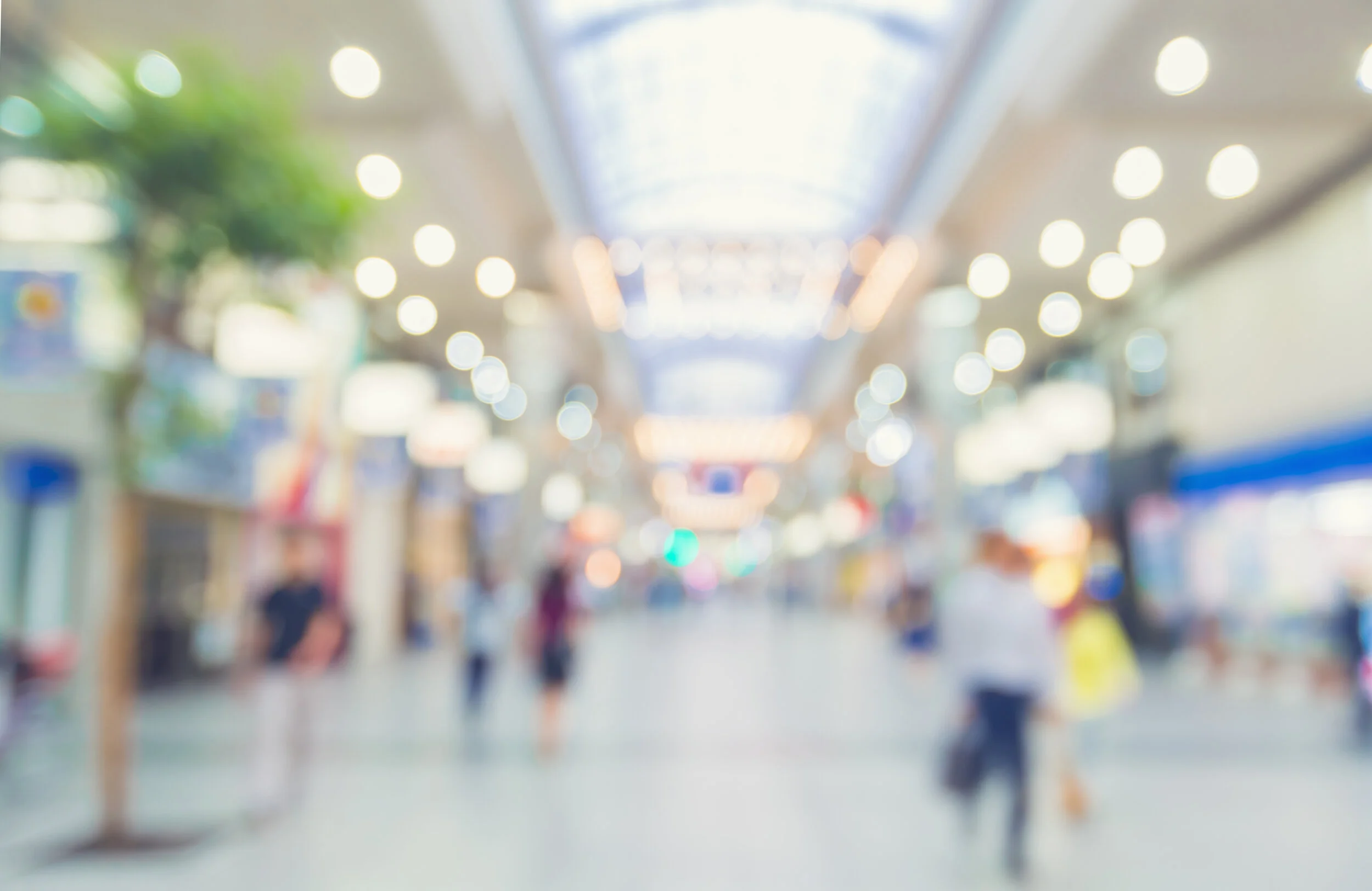graphicstock-defocused-shopping-mall-interior-with-anonymous-people-walking_HWzlZpVneOZ.jpg