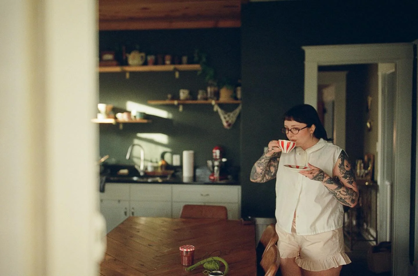 I thrifted this mug + had half a roll of film to burn through, so here is me in my home 🖤

It&rsquo;s been a while since I&rsquo;ve done any sort of about me, so here are some fun facts:

1. I drink hot coffee year round, even when it&rsquo;s hot ou