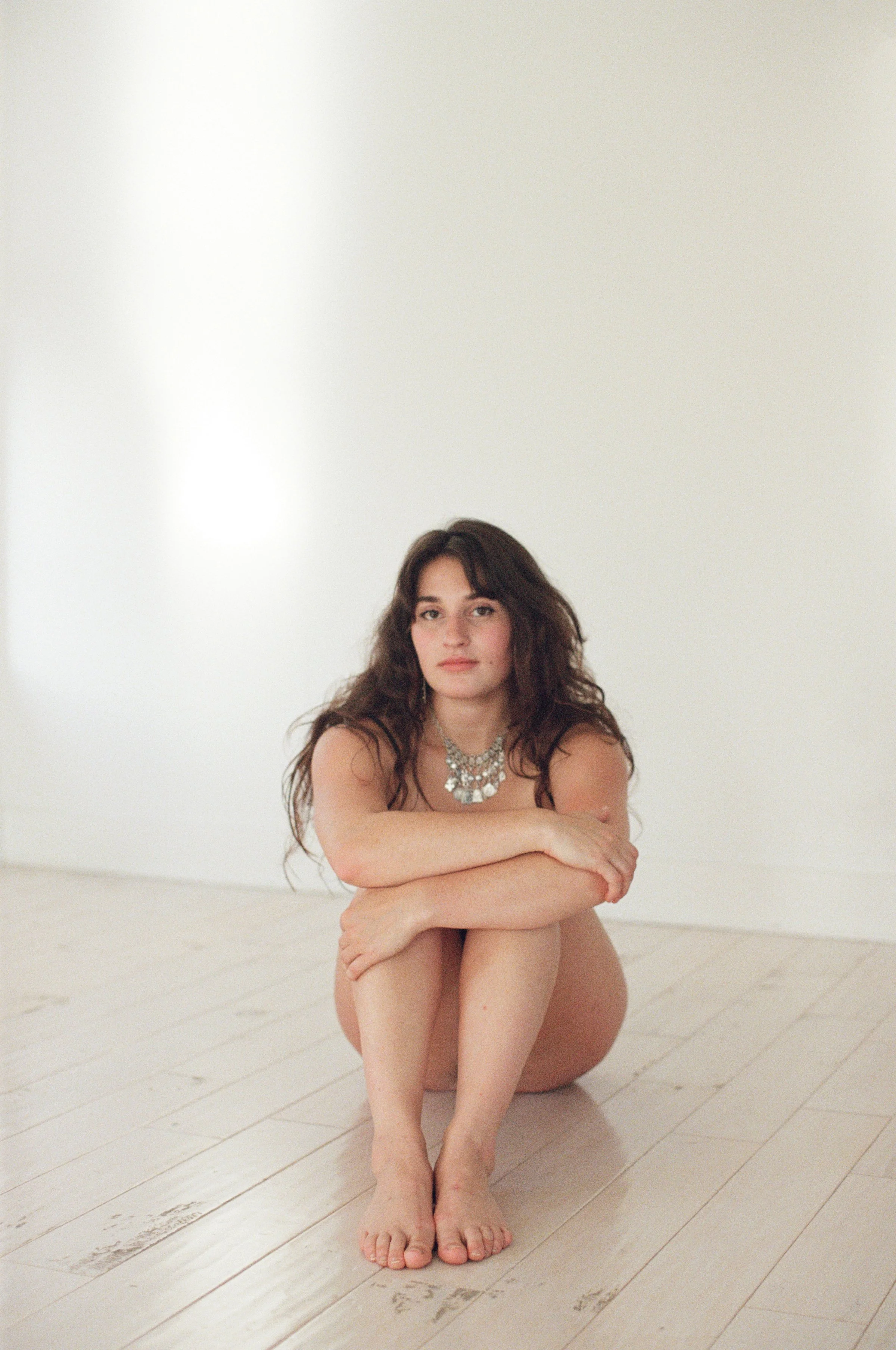Shot of a partially nude person, shot in a studio