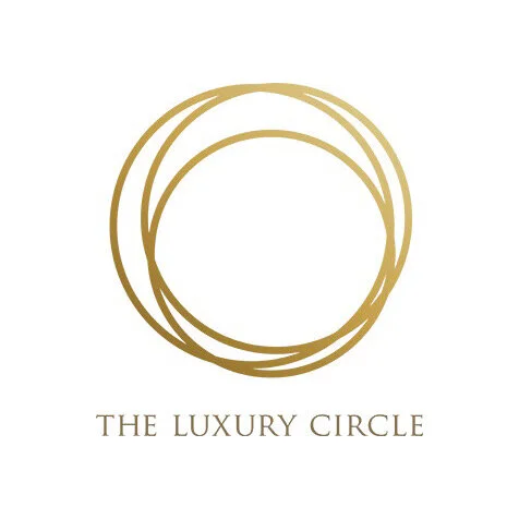 Gold circular logo with the words 'The Luxury Circle' below it.