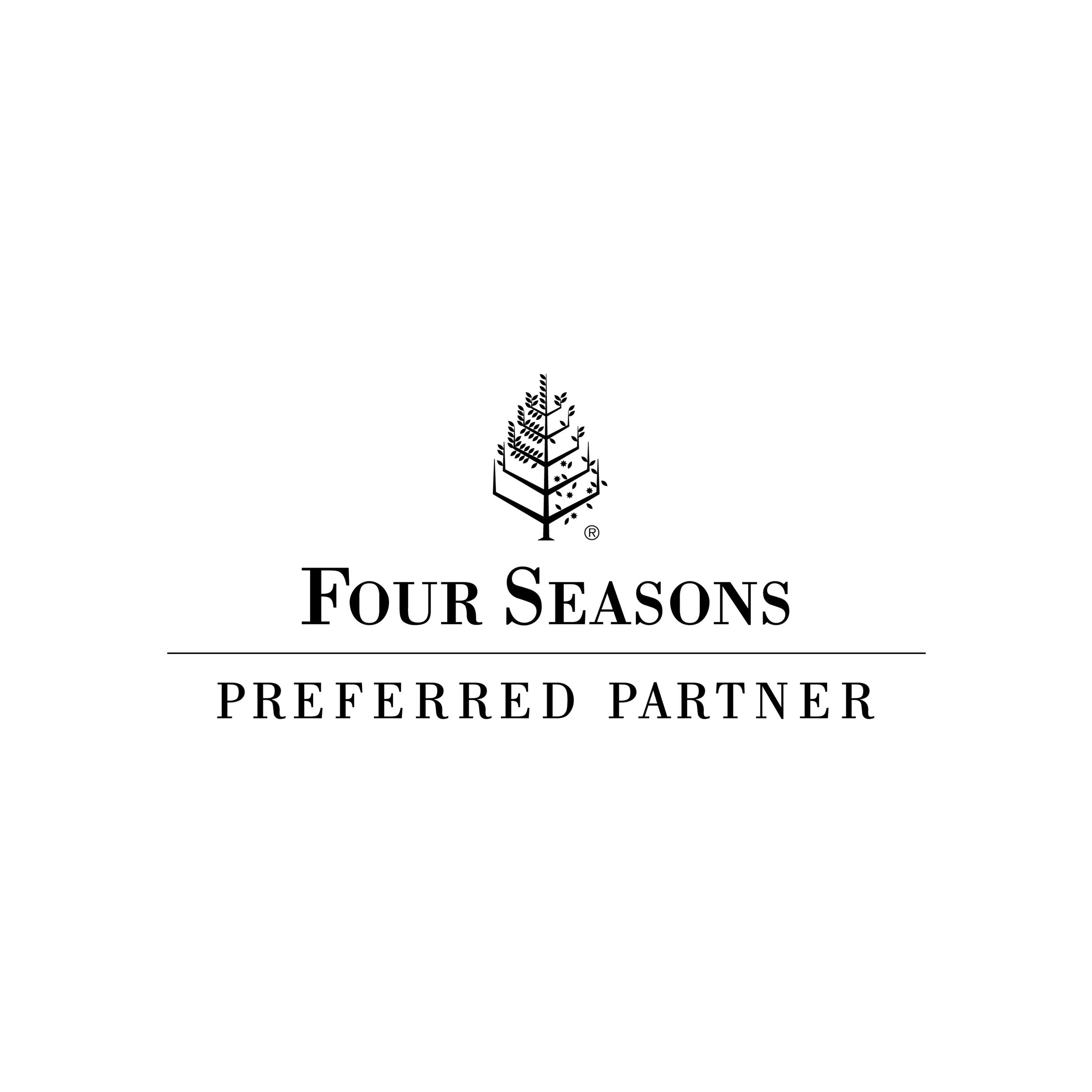 Four Seasons Preferred Partner logo featuring a stylized pine tree and text in black on a white background.