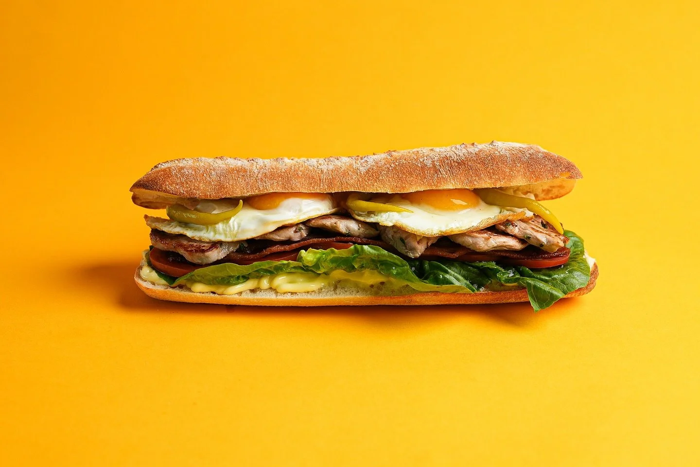 Chivito
pork loin, bacon, egg, lettuce, tomato, pickled spicy Basque green pepper, mozzarella, alioli, sliced tomato, little gem
#bocatas #barceloneta #meflipa #miami #sandwich