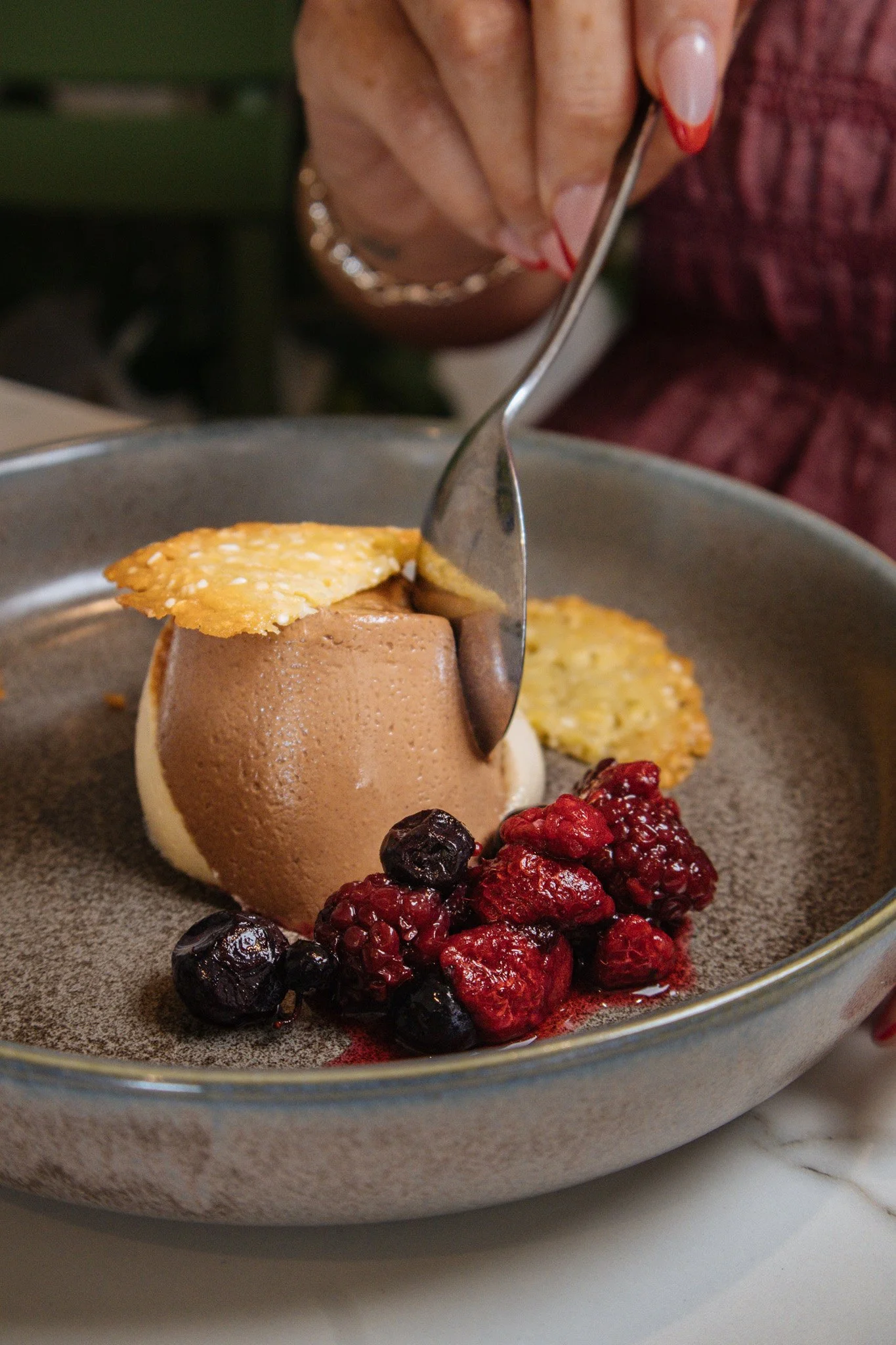 Ending the shoot on the sweetest note 🤎✨

Bailey&rsquo;s &amp; Chocolate Panna Cotta
with macerated berries and a sesame tuile.

Silky, rich and just the right amount of indulgent.