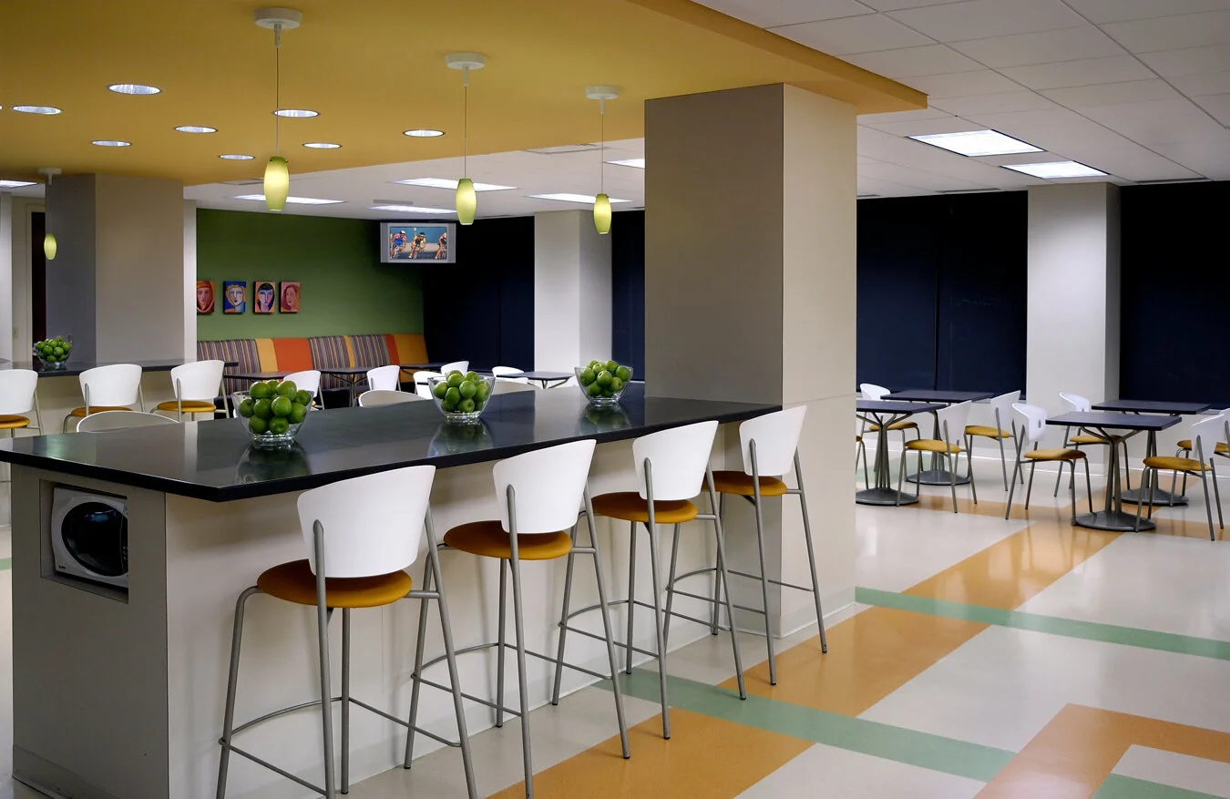 Baker Donelson law firm break room with counter seating and dining tables