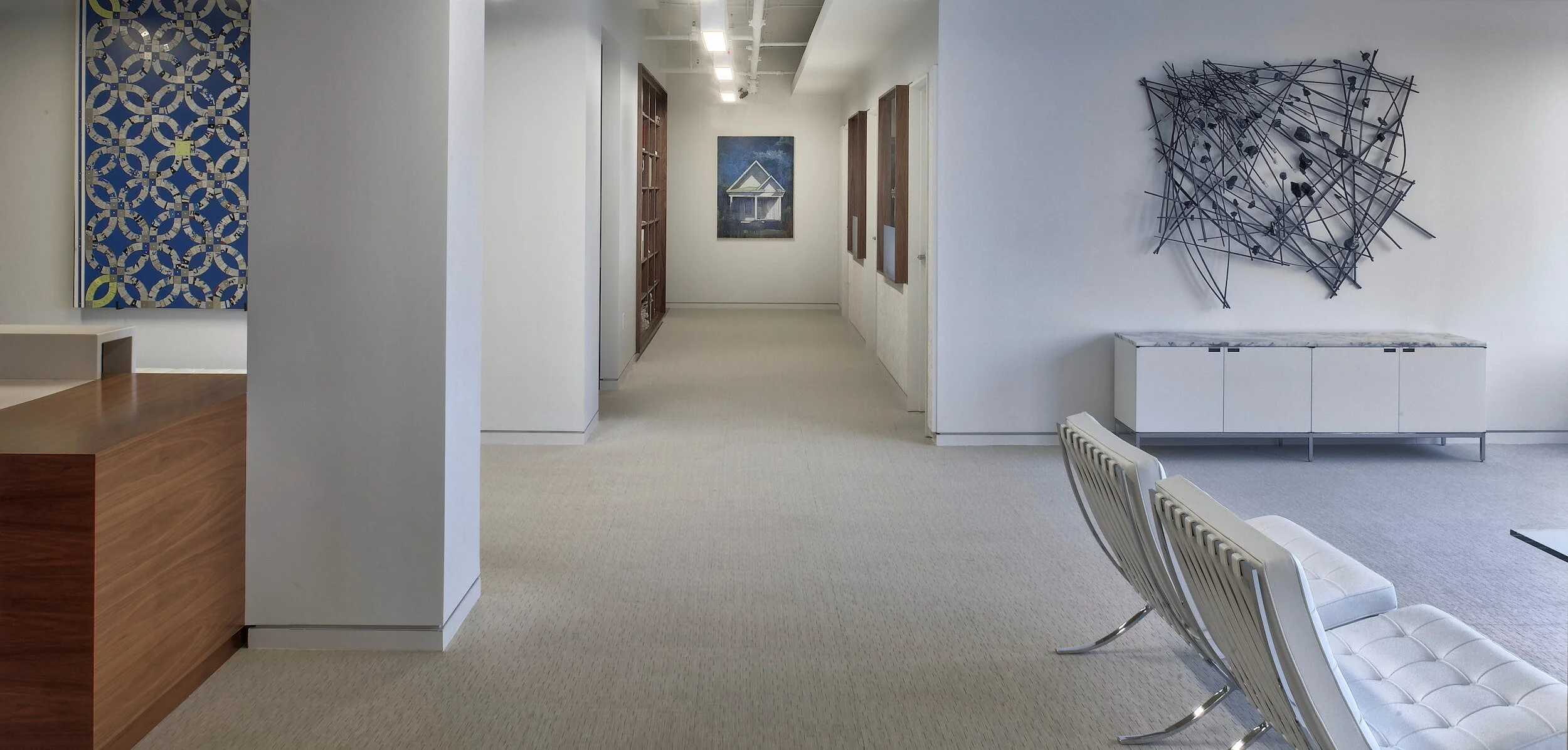 A corridor at Mercer Capital leads to the waiting room with Knoll furniture