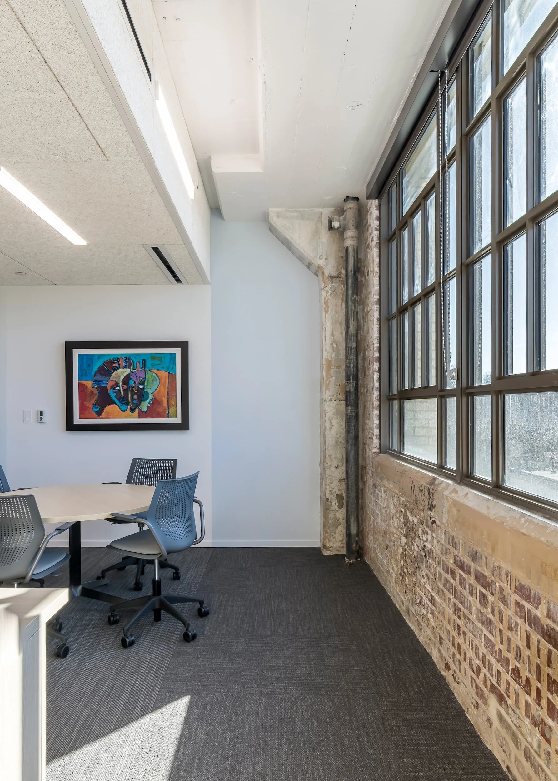 Office furniture in a collaborative meeting space