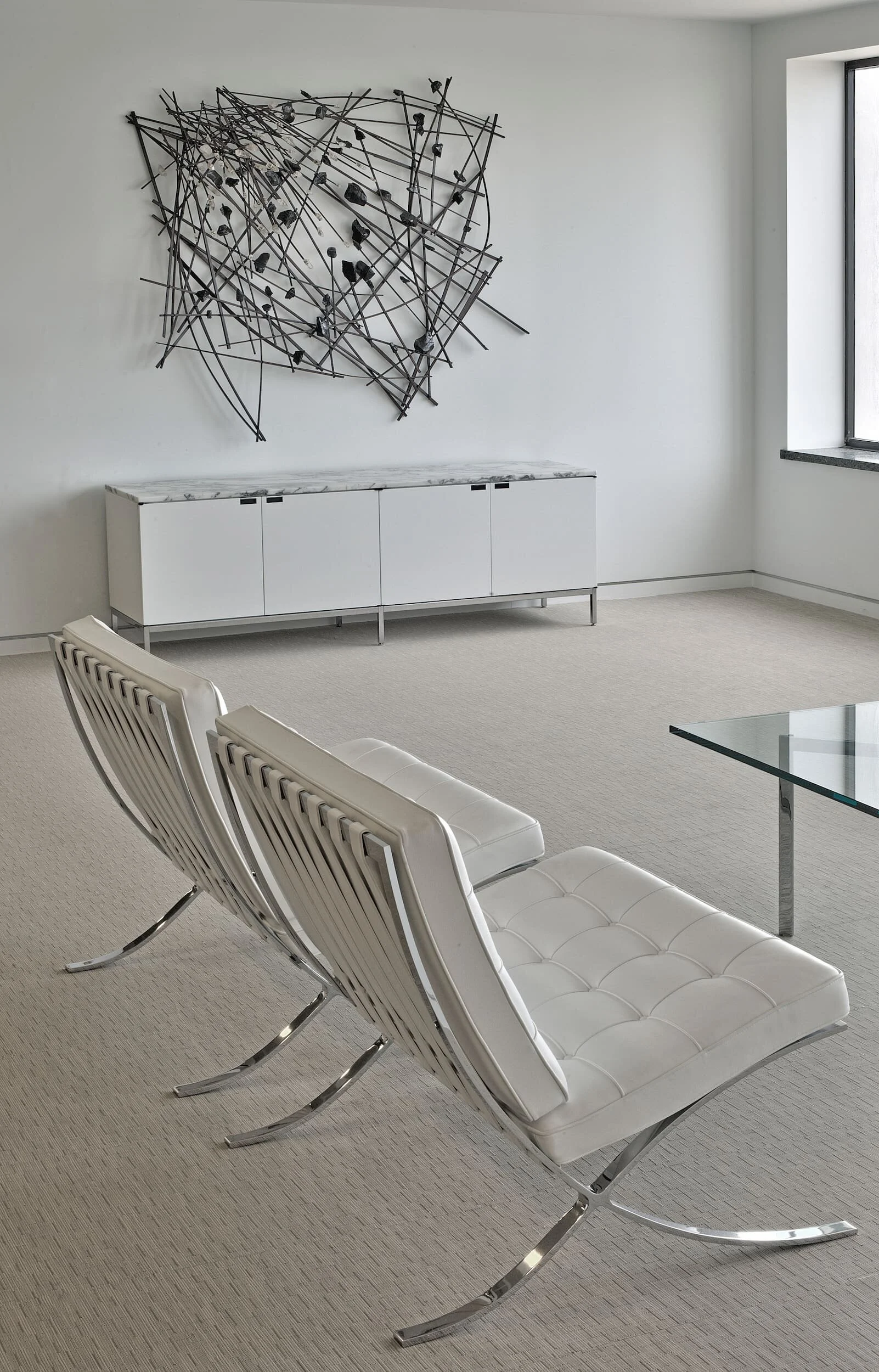 Mercer Capital waiting room with Knoll Barcelona chairs, a Florence Knoll credenza, and a Florence Knoll coffee table