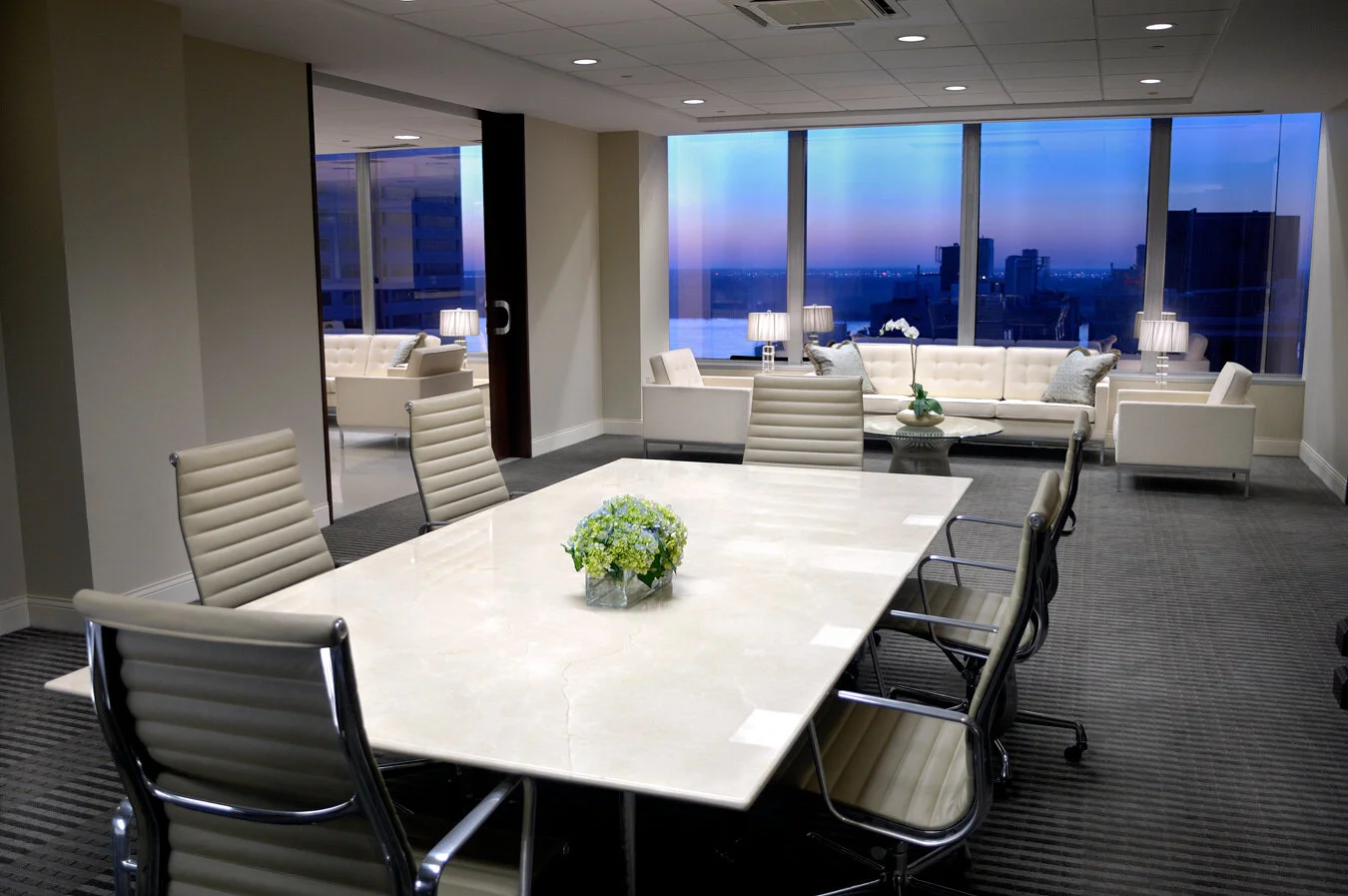 Baker Donelson law firm meeting room with Florence Knoll seating, Platner coffee table, conference table, and task chairs