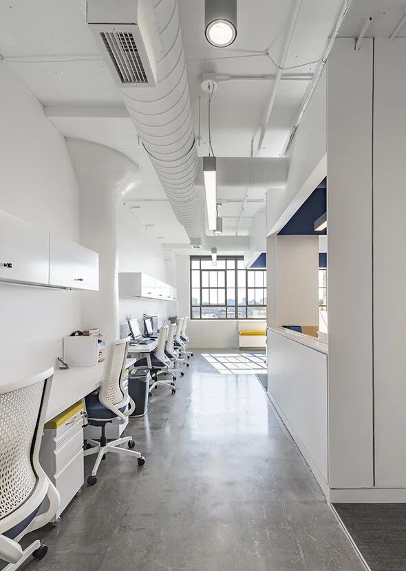 Workstations, mobile storage, and task chairs in an office