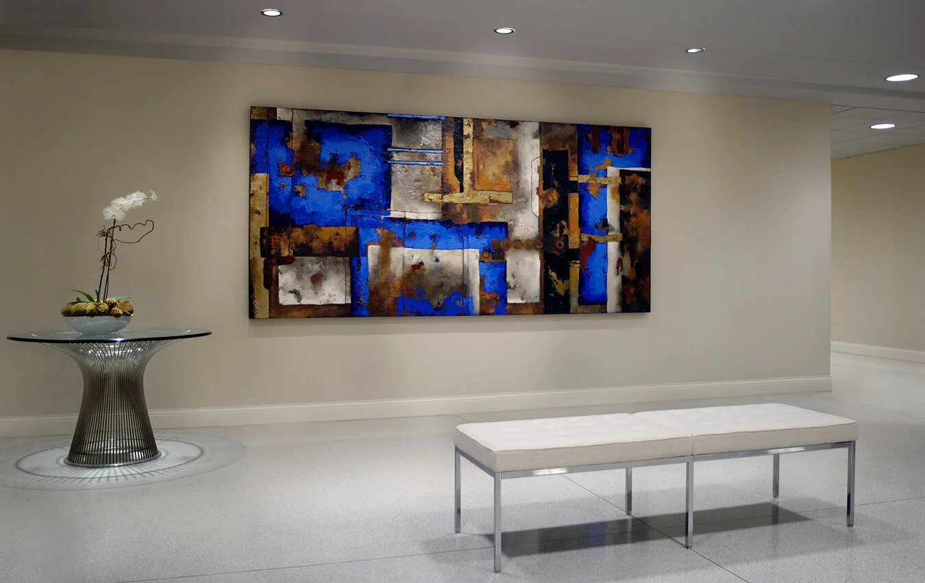 Baker Donelson law firm seating area with Florence Knoll bench and Platner table.