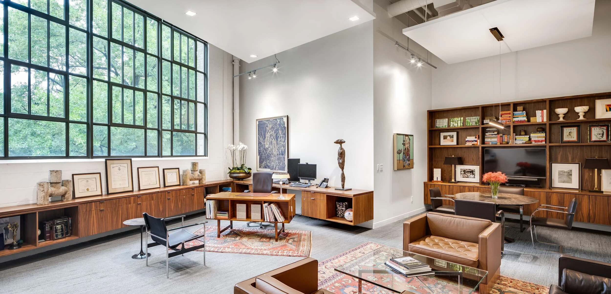 An executive office suite at nexAir corporate headquarters with lounge seating