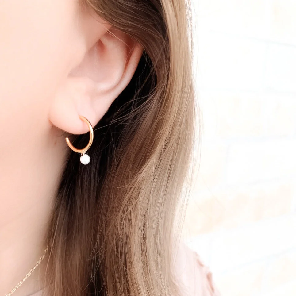 pearl huggies on.JPG