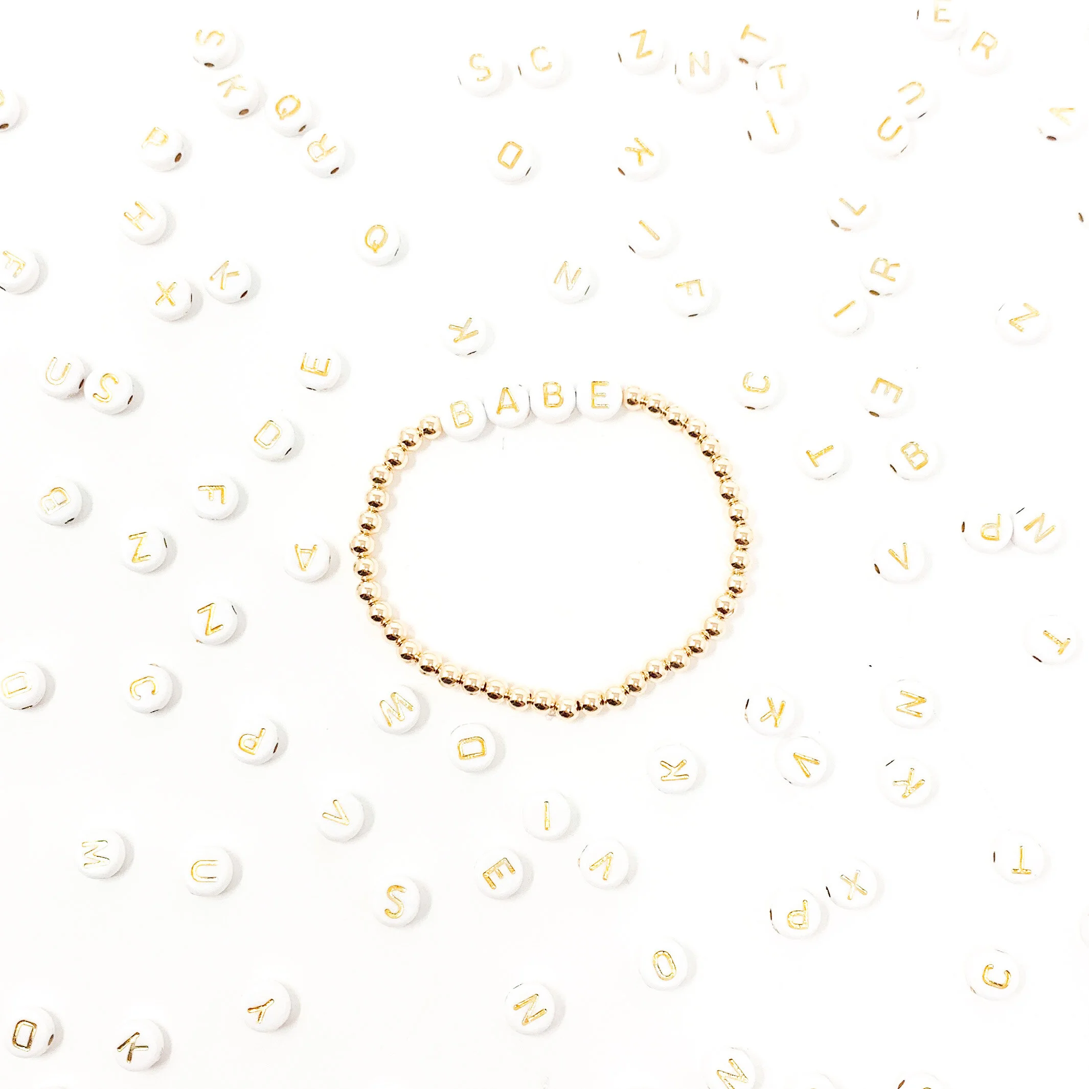 custom gold letter bracelet.JPG