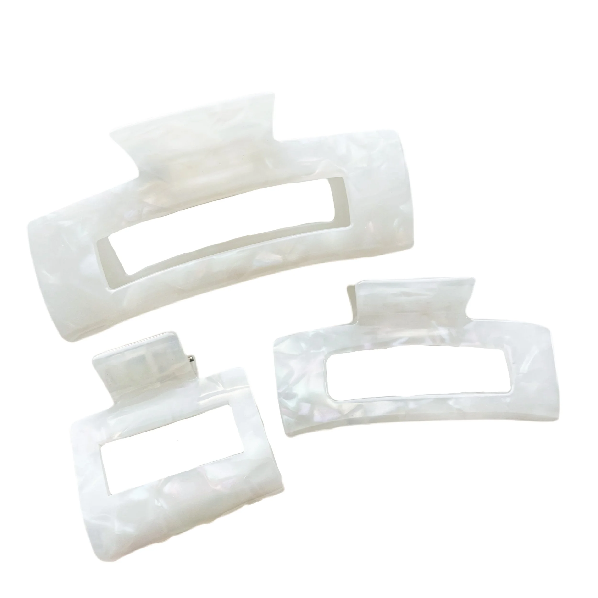 3 white iridescent clips.JPG